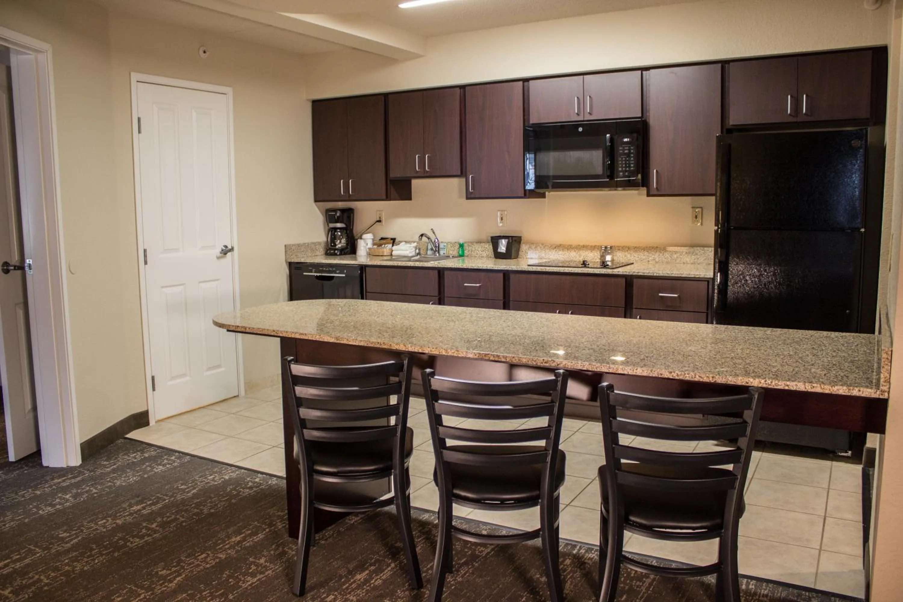 Kitchen or kitchenette in Cobblestone Suites - Oshkosh