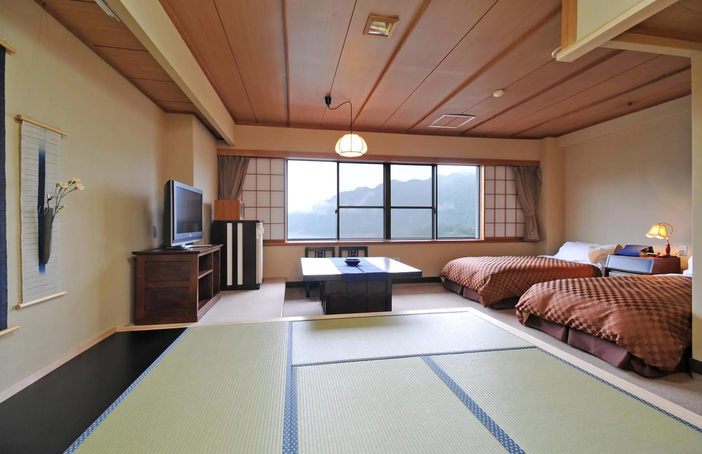 Bed in Sarugakyo Hotel