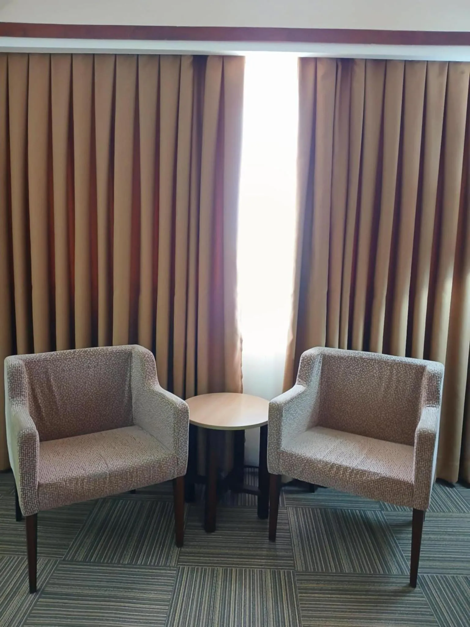 Seating area in Dohera Hotel