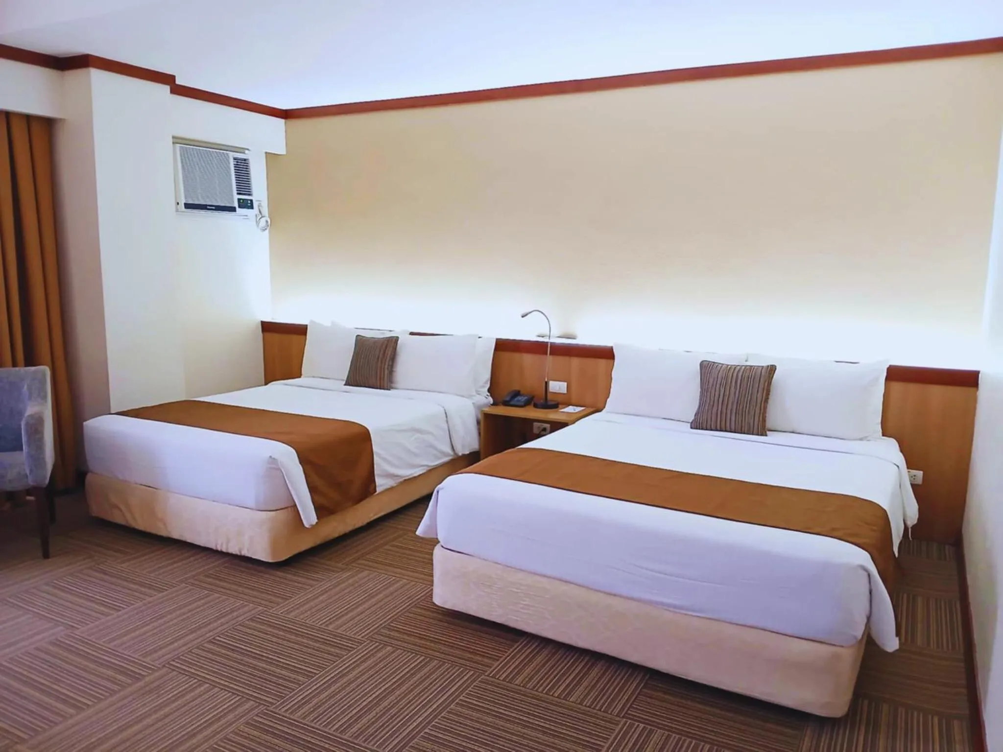 Bed in Dohera Hotel