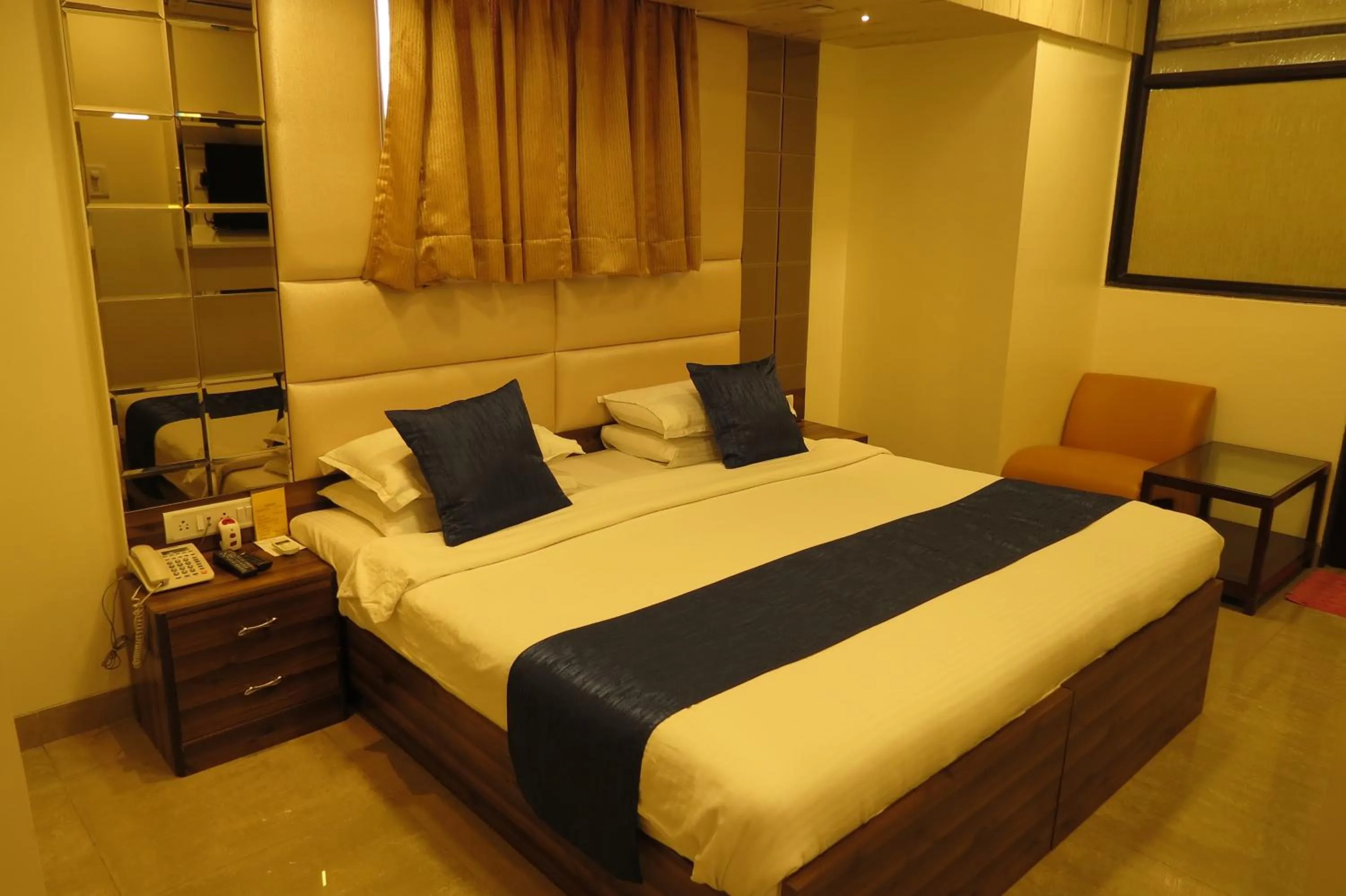 Bed in Jyoti Dwelling Hotel