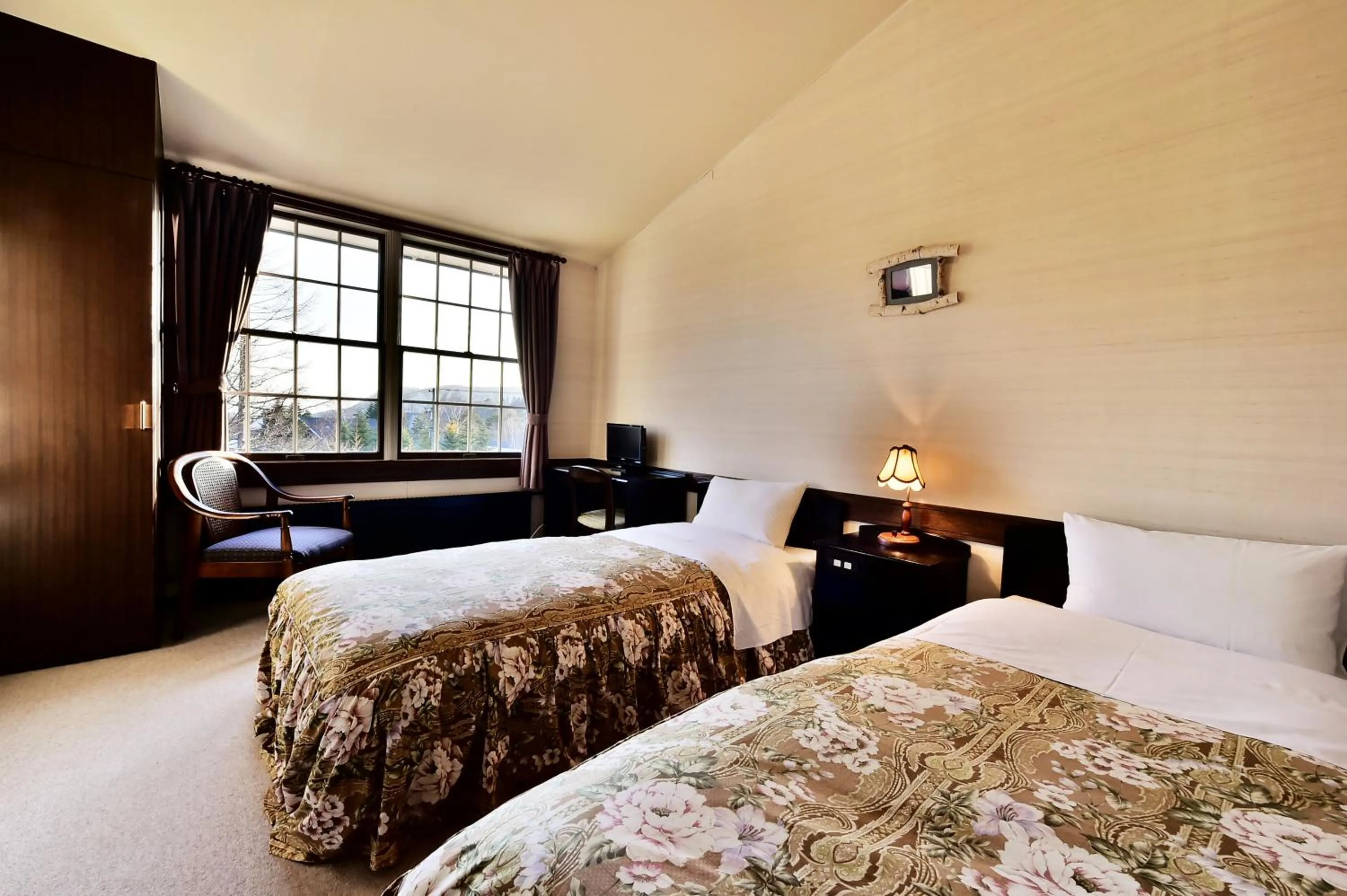 Bedroom, Bed in Petit Hotel Kanan