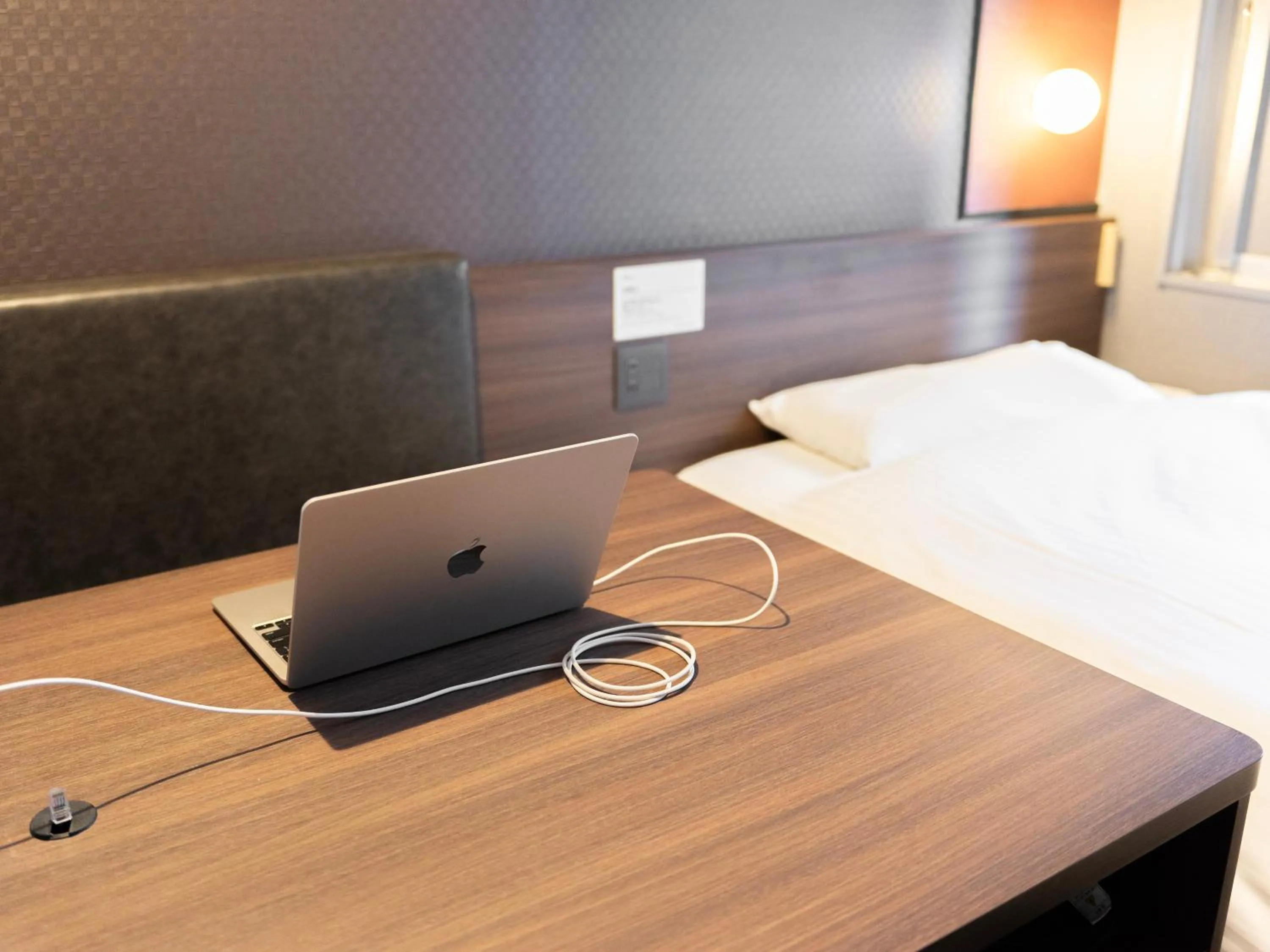 Bed in Super Hotel Premier JR Nara Eki