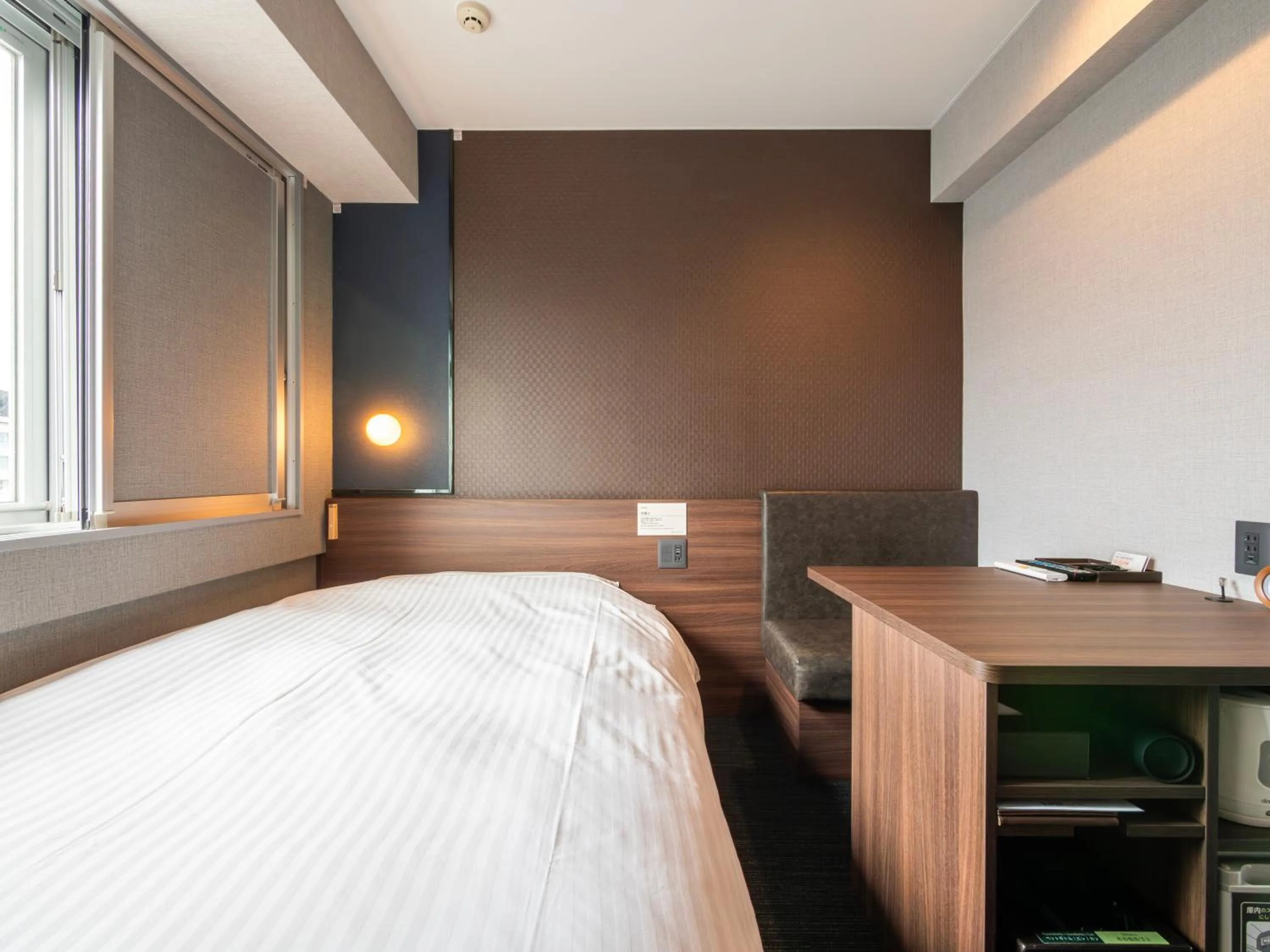 Bed in Super Hotel Premier JR Nara Eki