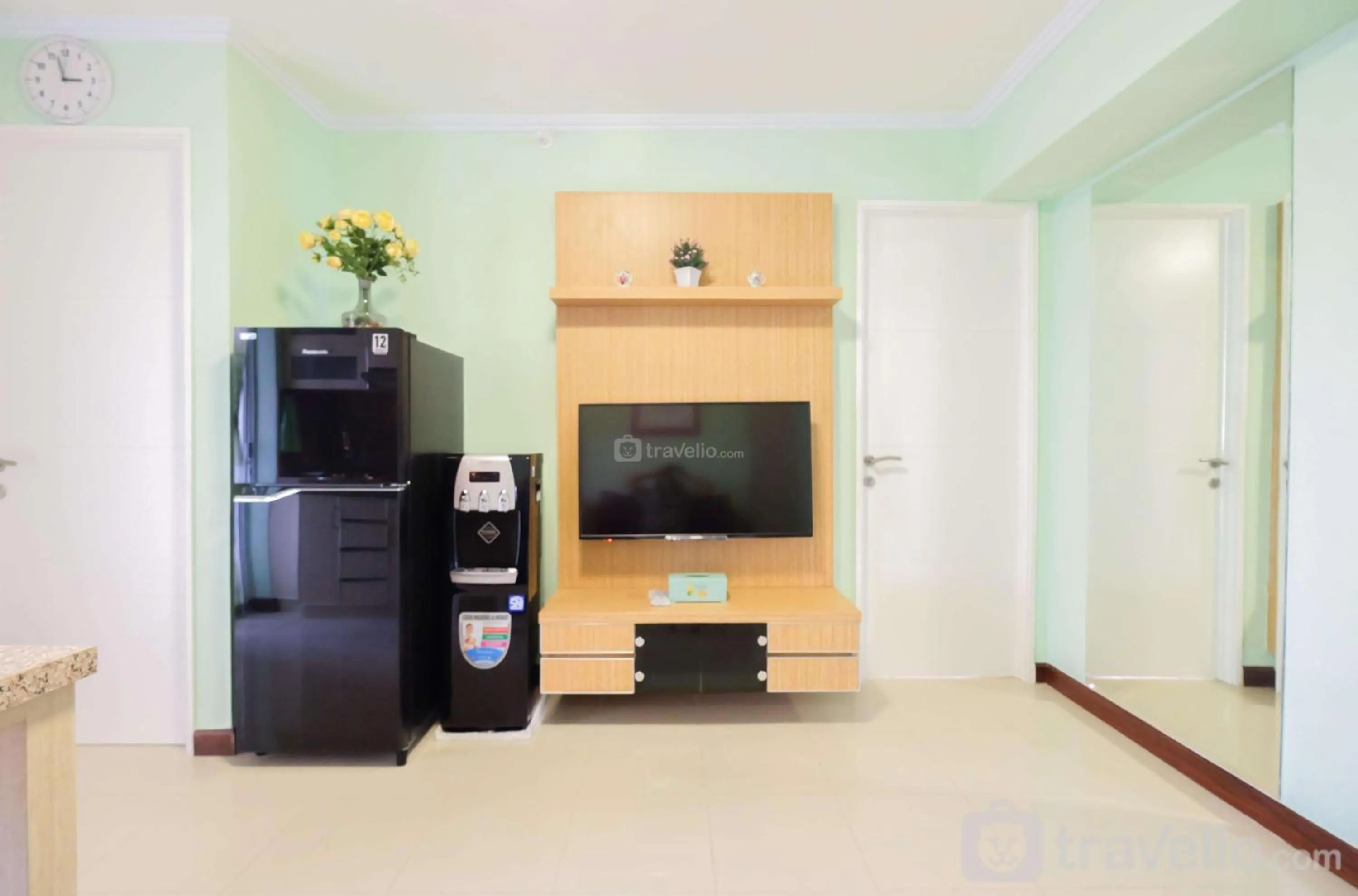 TV and multimedia in Cozy 2BR Bassura City Apartment By Travelio
