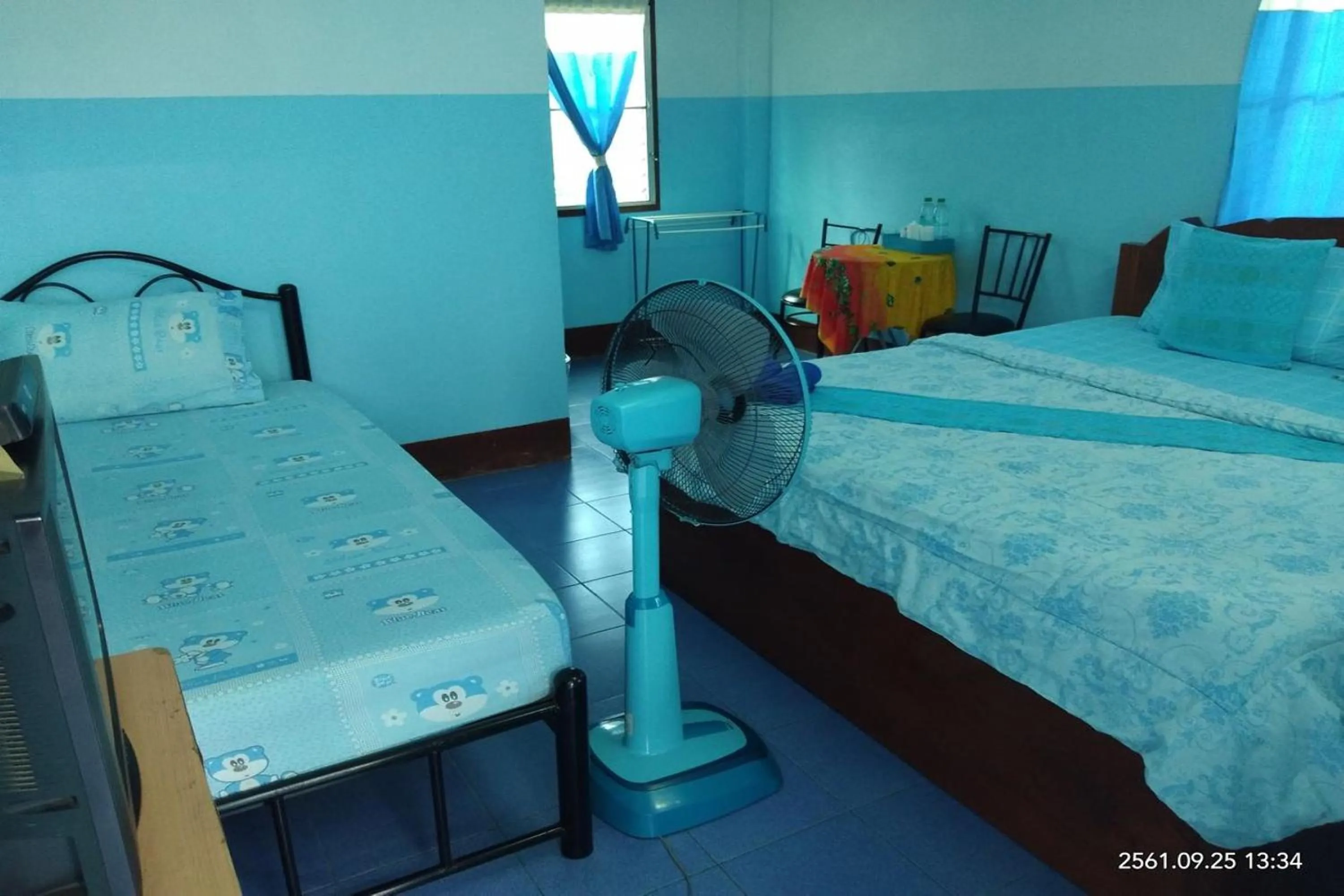 Photo of the whole room, Bed in Blue House Pai