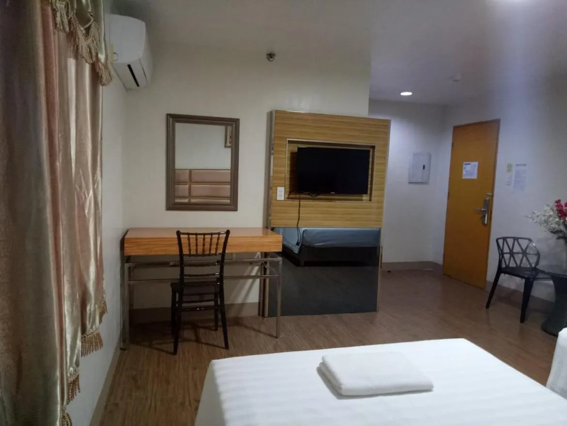 TV and multimedia, Bed in Meaco Royal Hotel - Batangas City