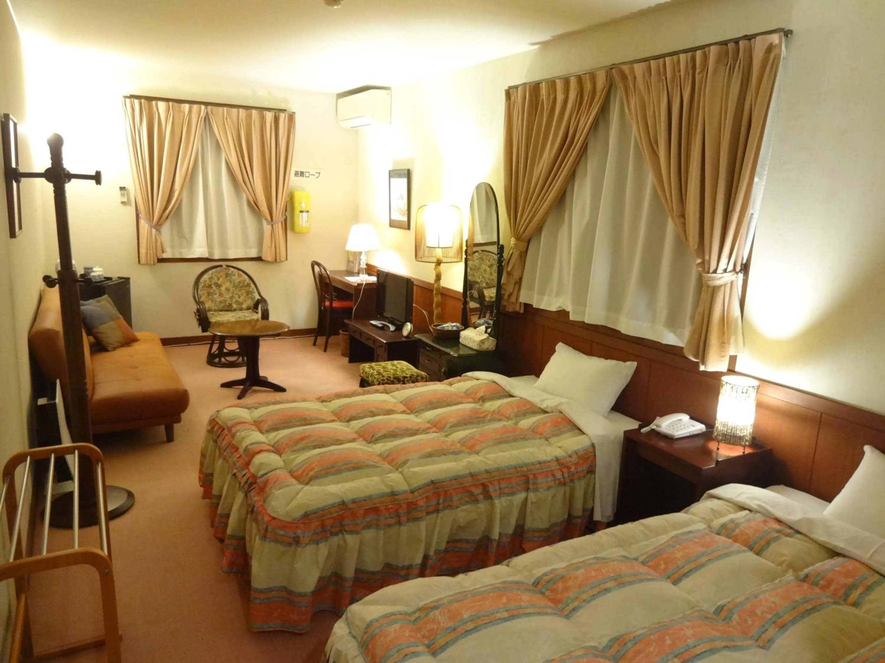 Photo of the whole room, Bed in IZUNA INN & SPA - the veggie delights