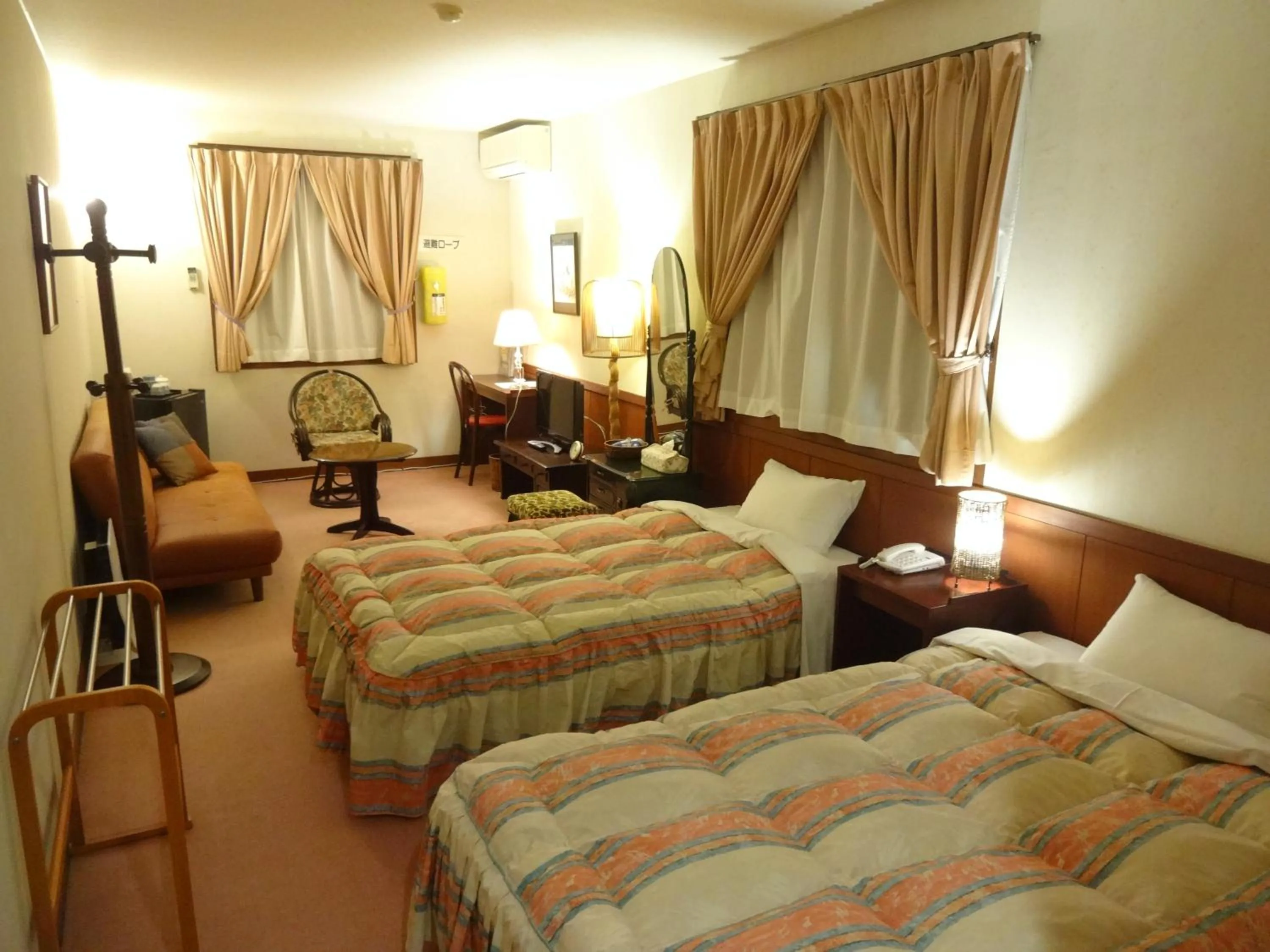 Bed in IZUNA INN & SPA - the veggie delights