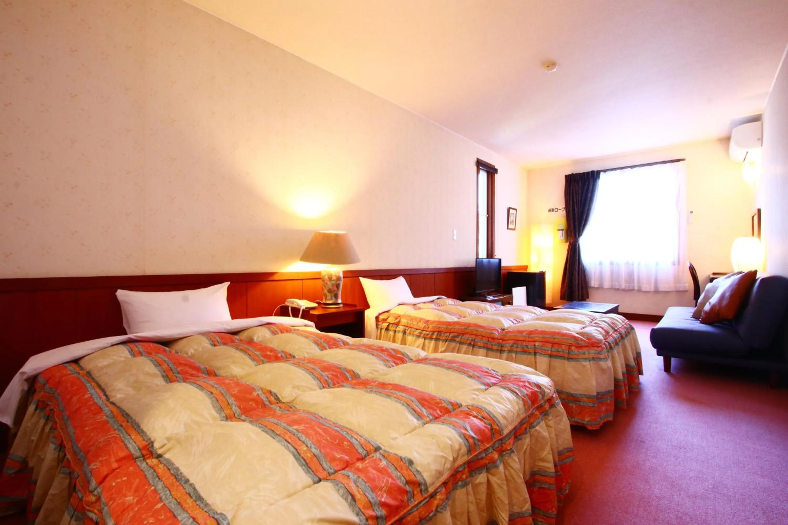 Photo of the whole room, Bed in IZUNA INN & SPA - the veggie delights