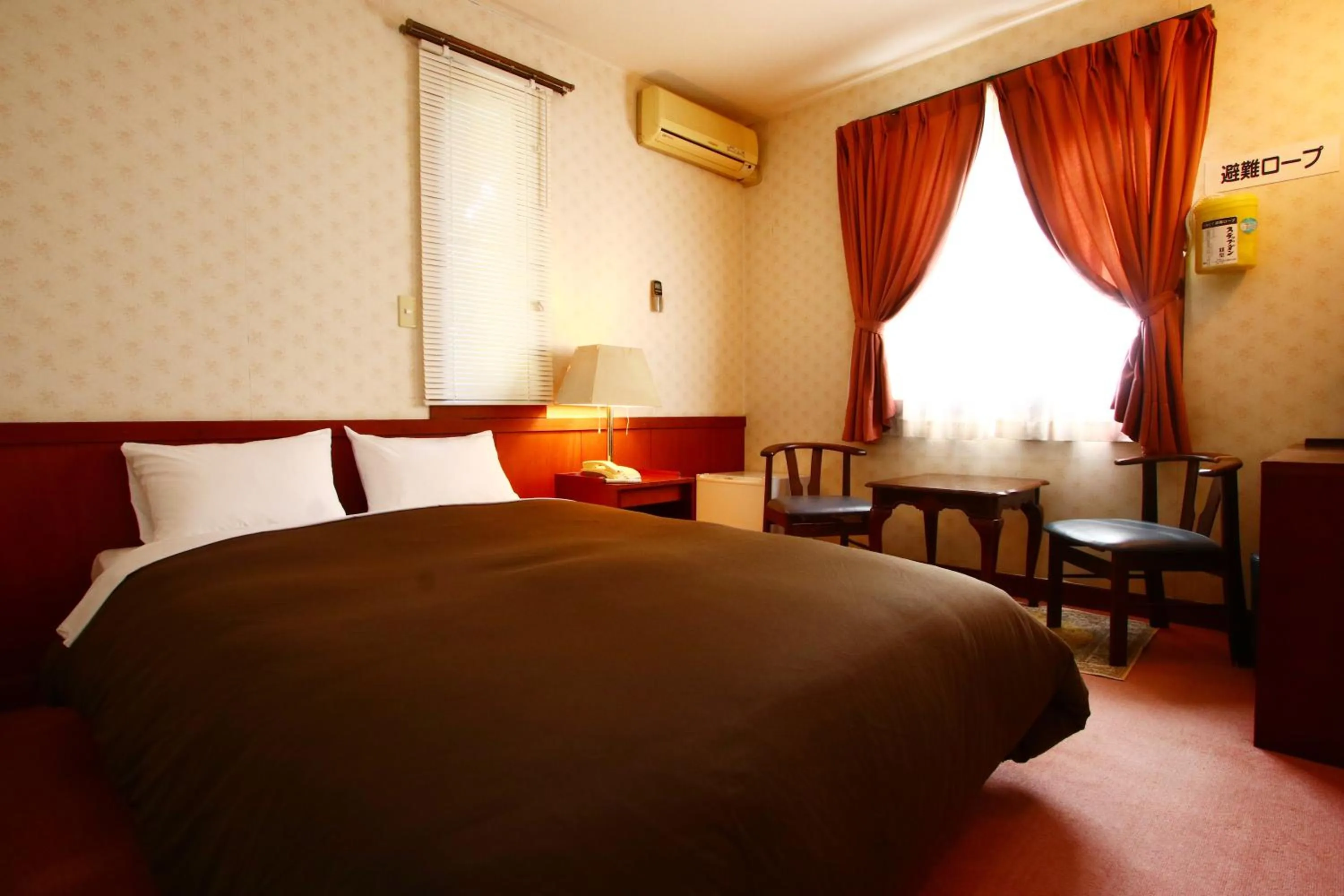 Photo of the whole room, Bed in IZUNA INN & SPA - the veggie delights