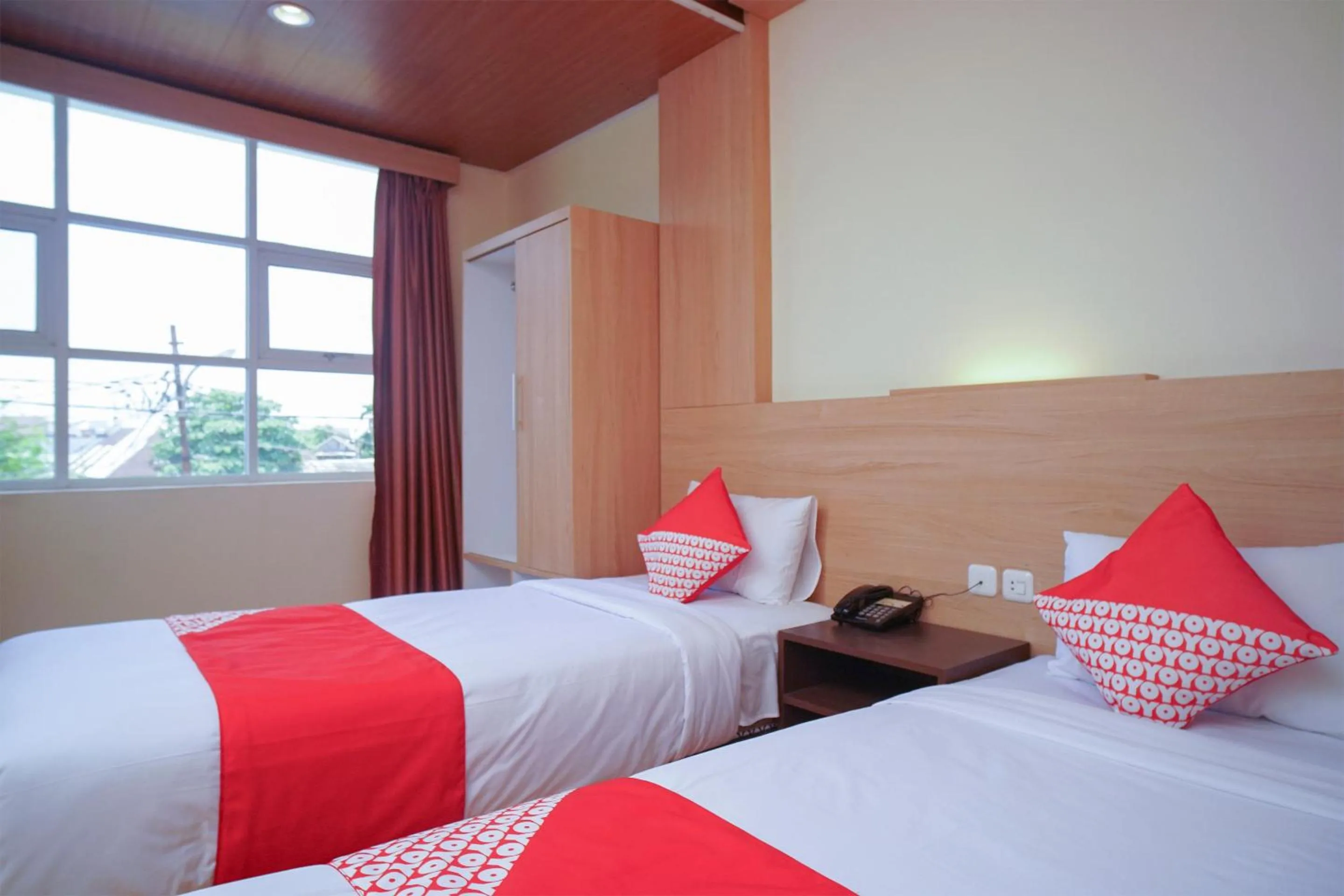 Bedroom in OYO 147 Hotel Winer