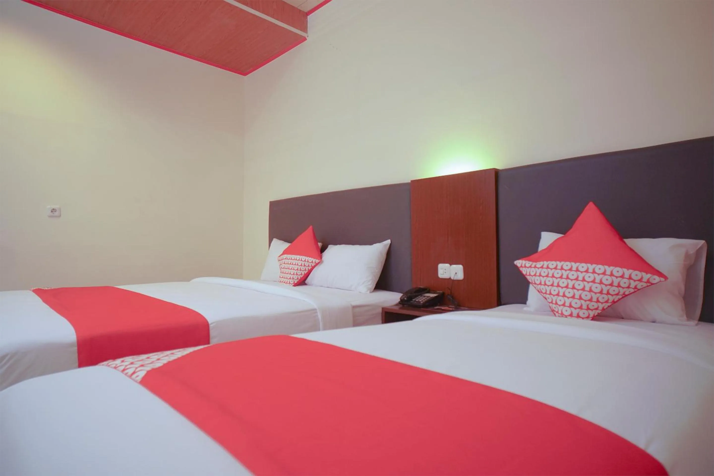 Bed in OYO 147 Hotel Winer