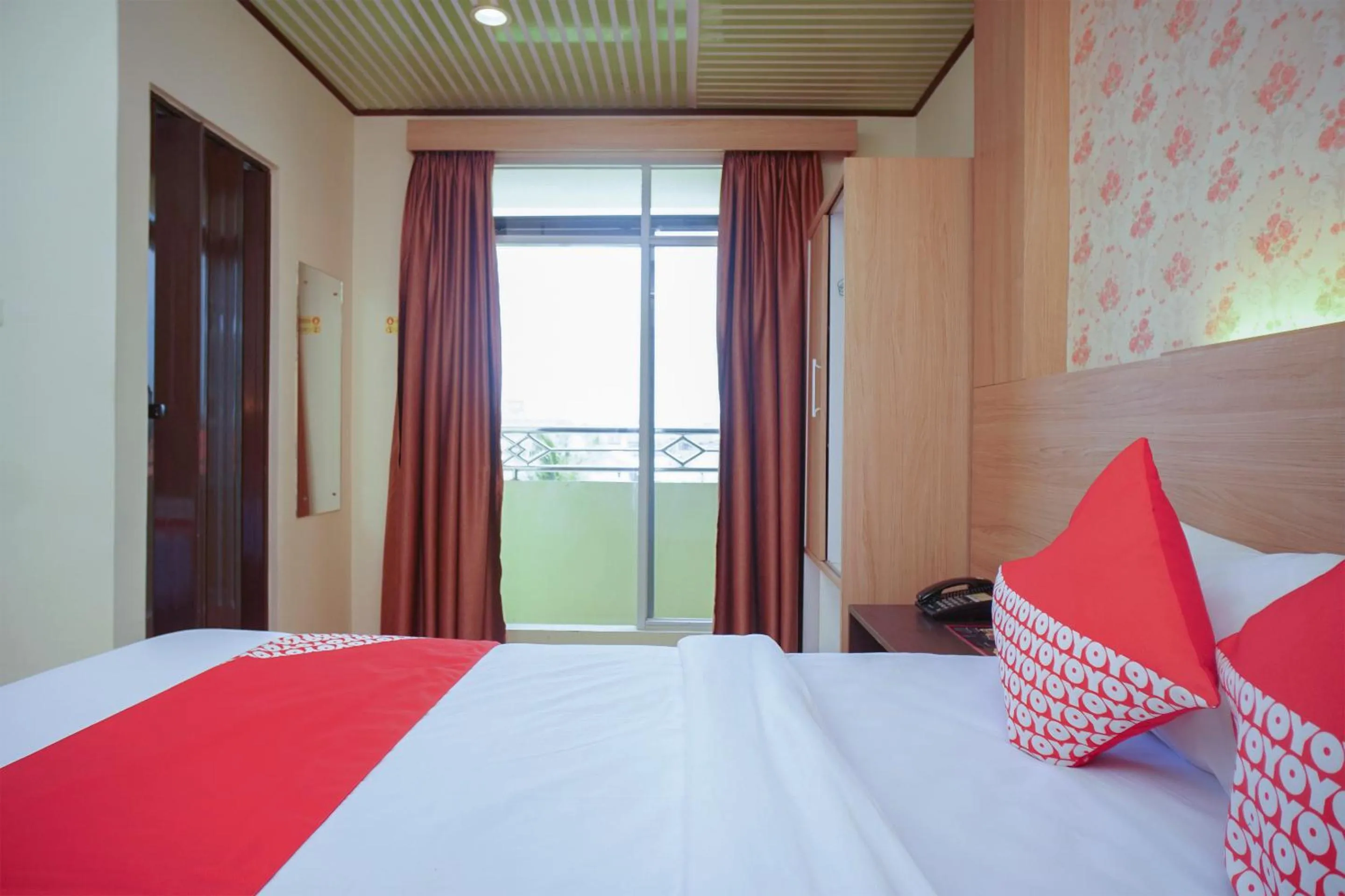 Bedroom in OYO 147 Hotel Winer