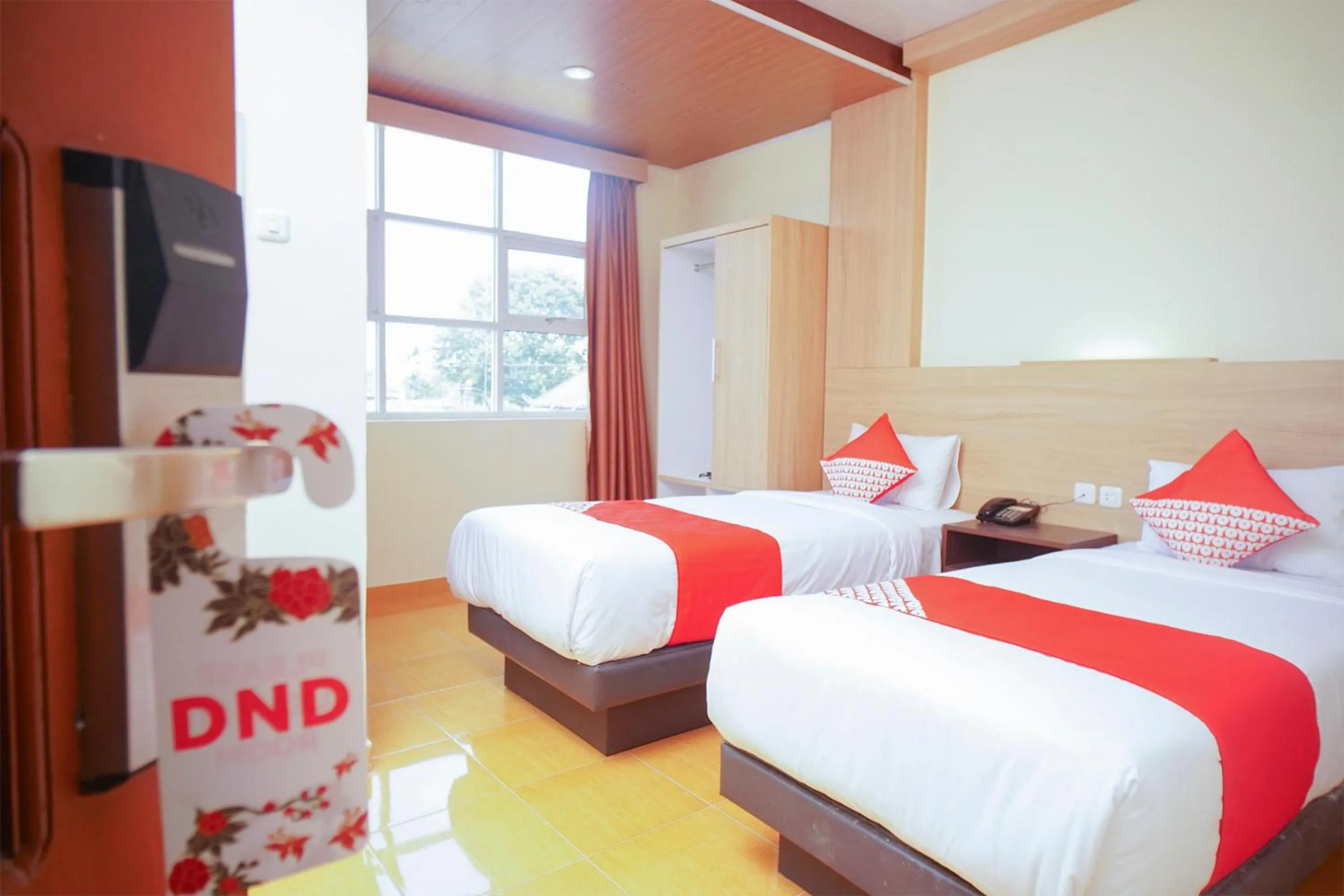 Bedroom in OYO 147 Hotel Winer