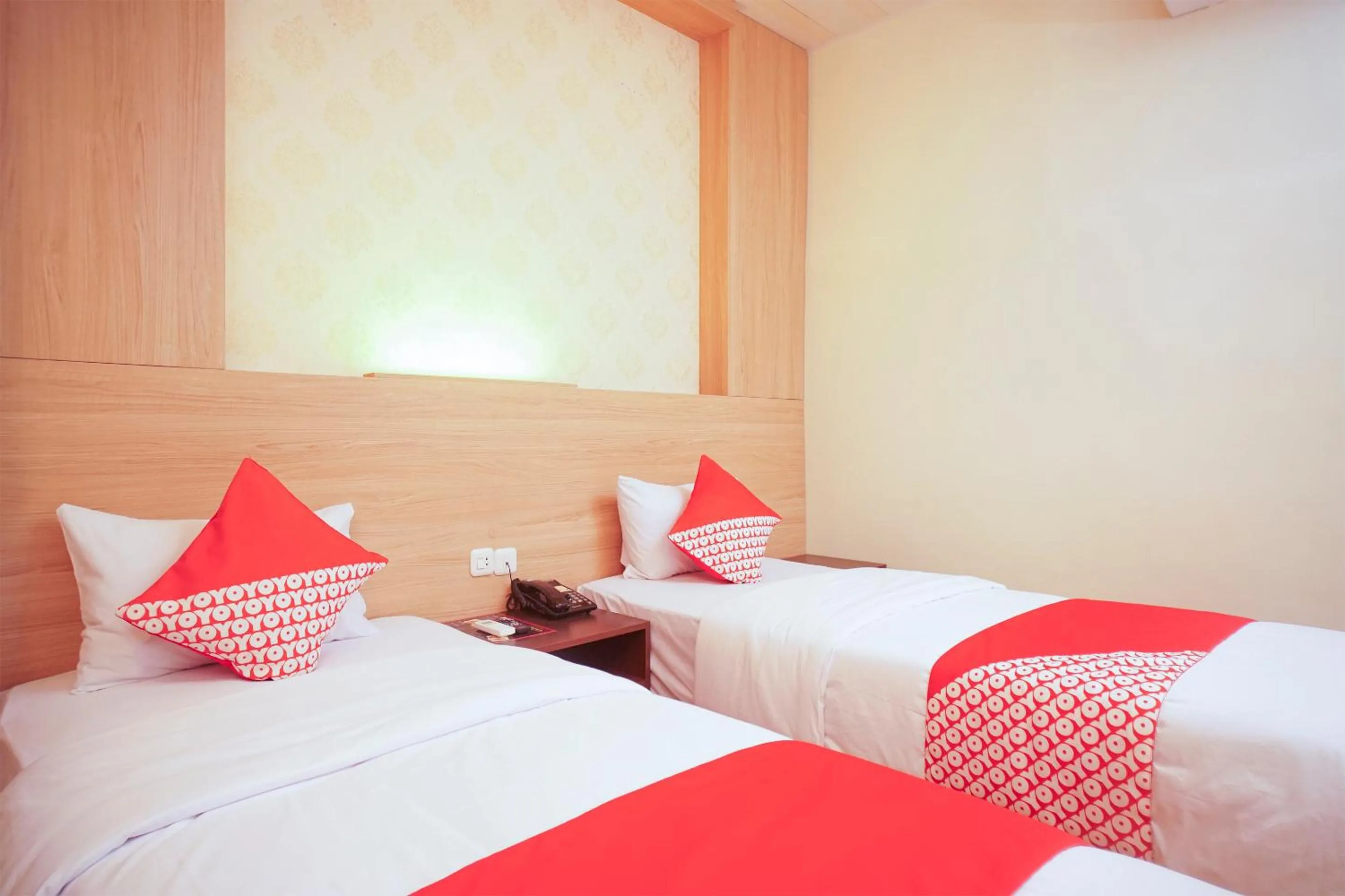 Bedroom in OYO 147 Hotel Winer