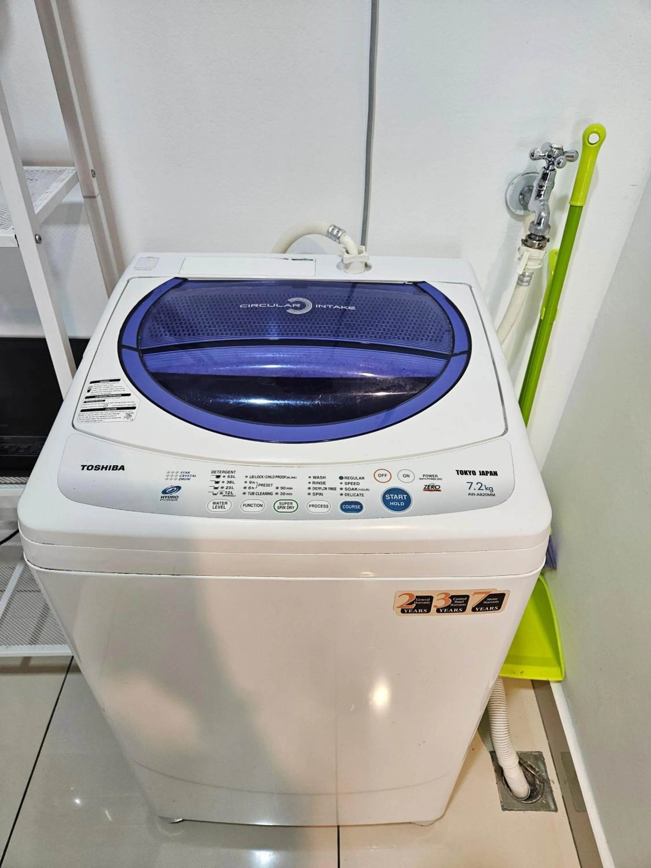 washing machine in Mansion One by Sky Hive