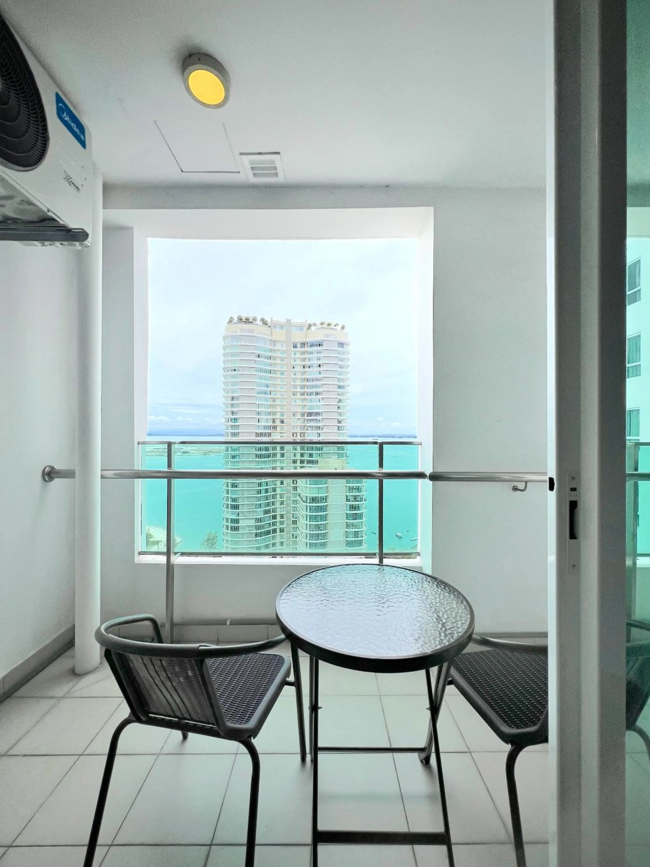 Balcony/Terrace in Mansion One by Sky Hive