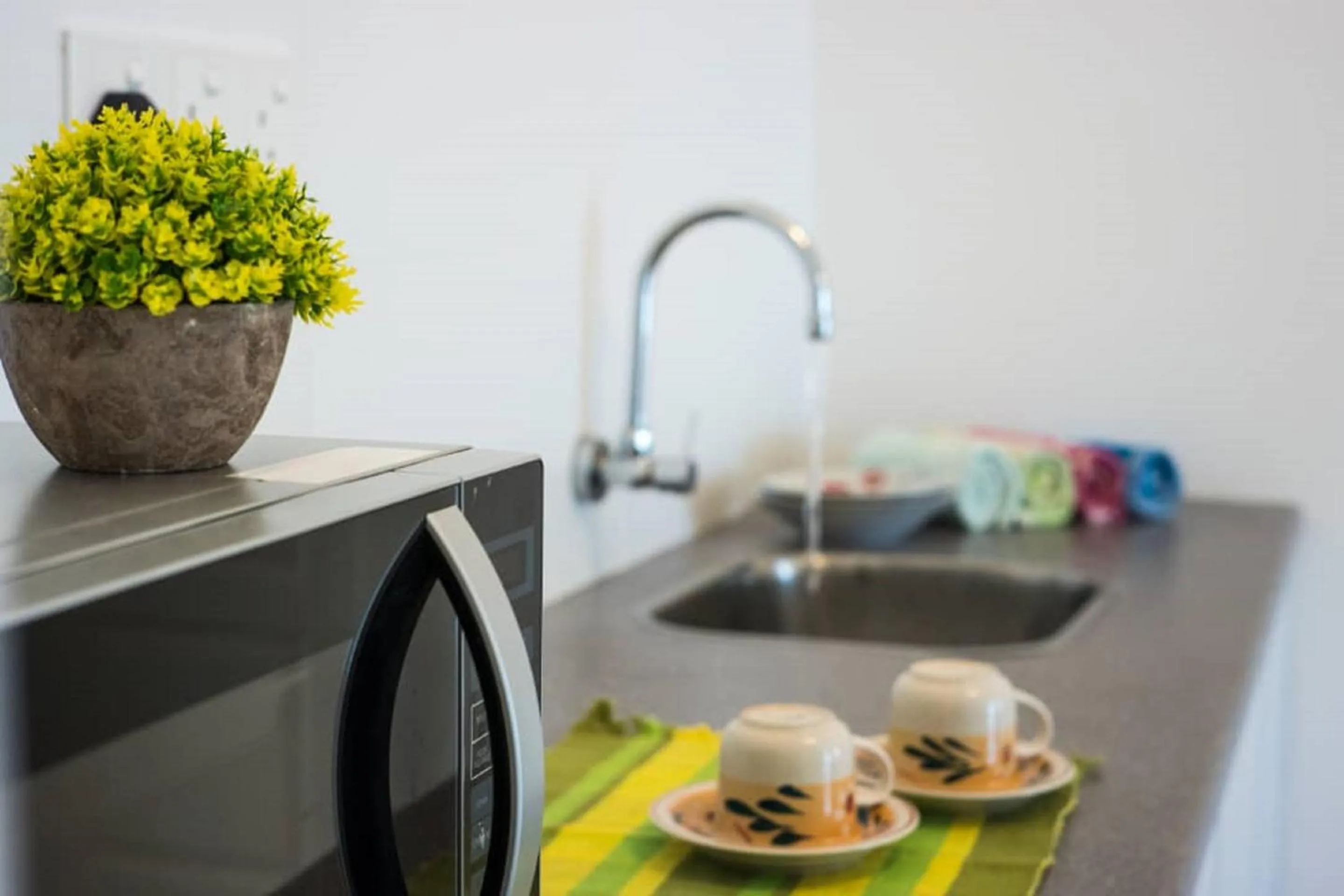 Coffee/tea facilities in Mansion One by Sky Hive