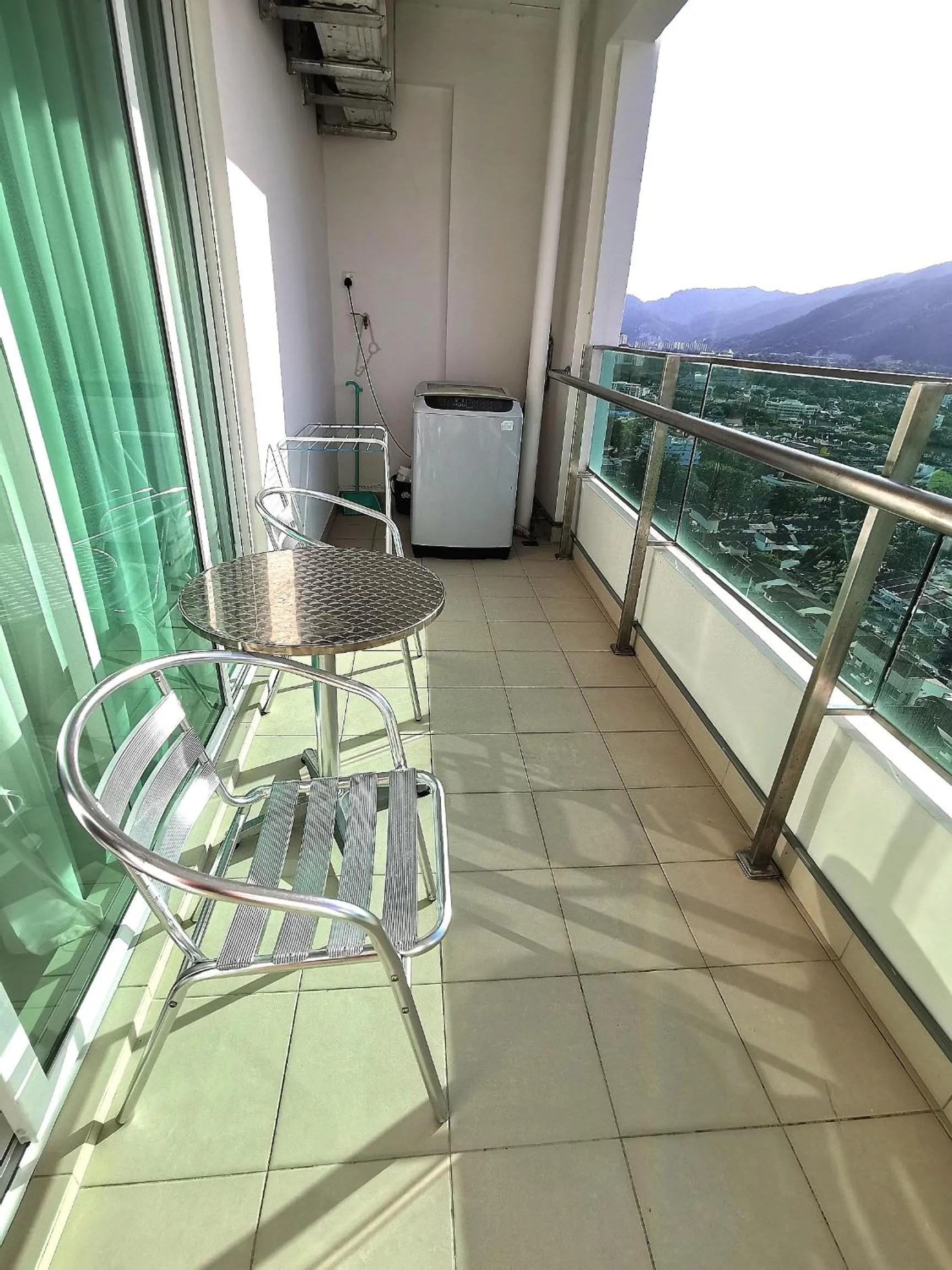 Balcony/Terrace in Mansion One by Sky Hive