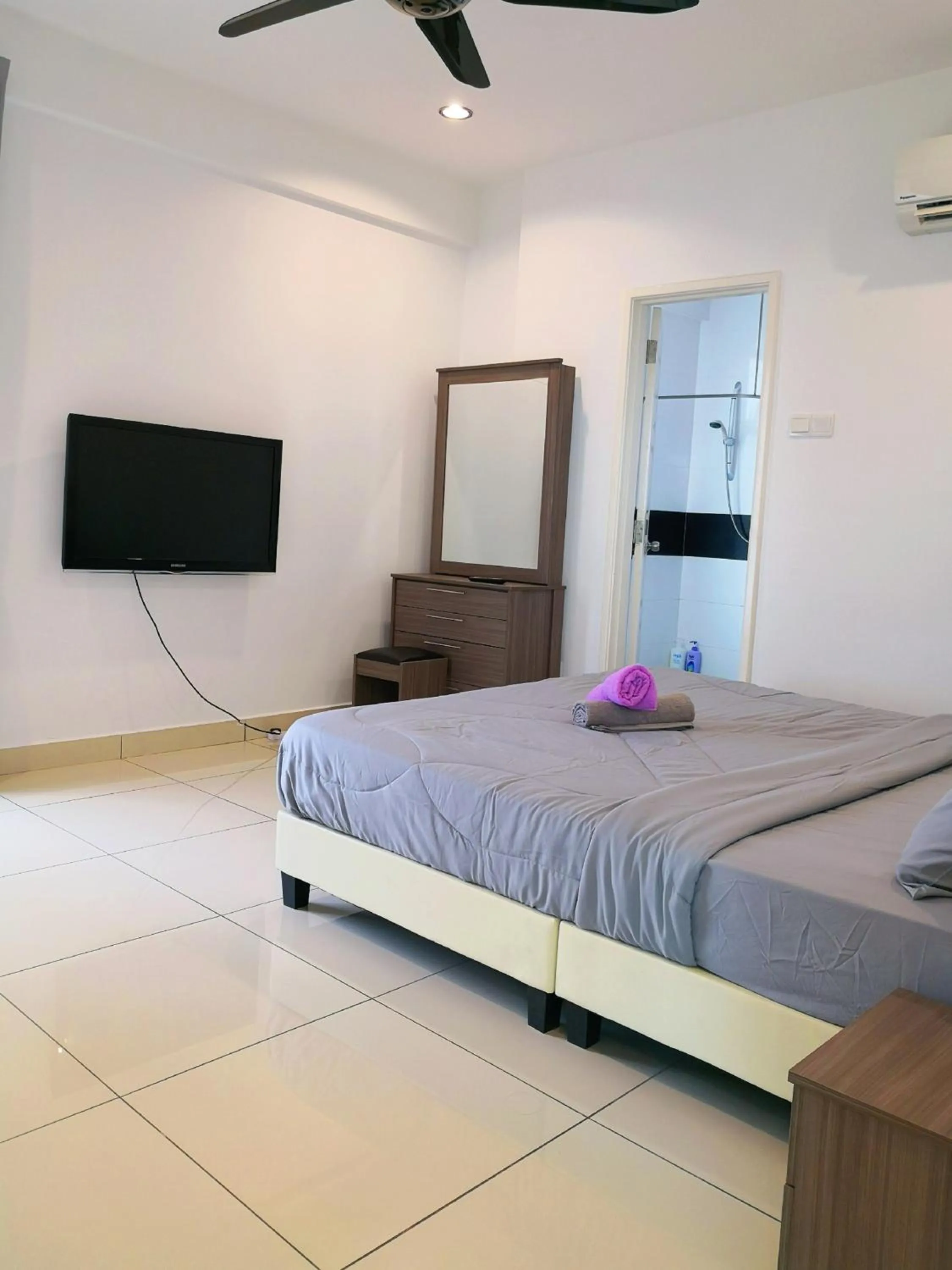 Bed in Mansion One by Sky Hive