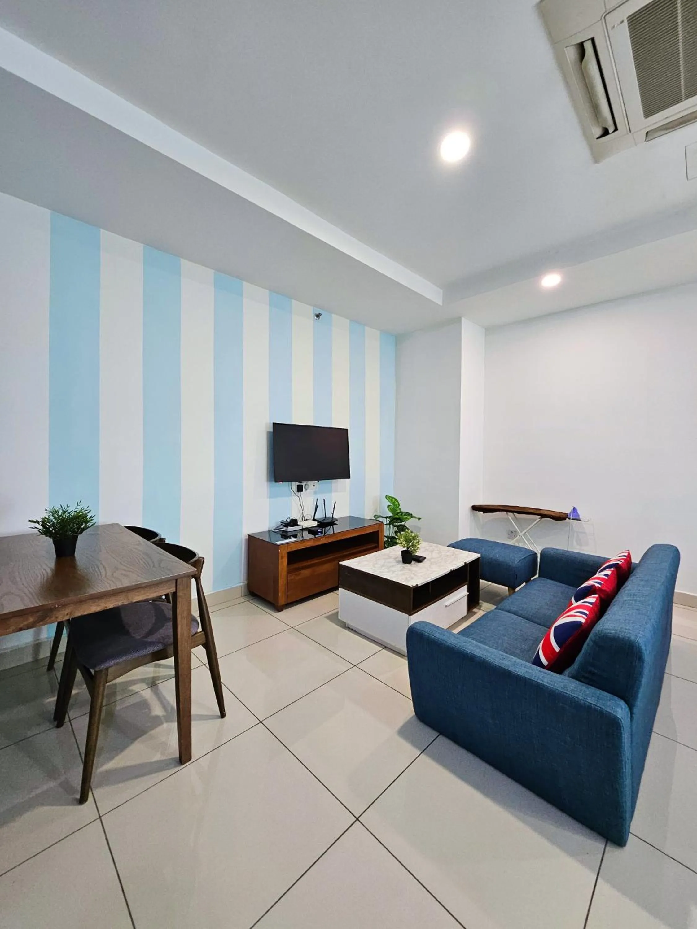 Living room in Mansion One by Sky Hive