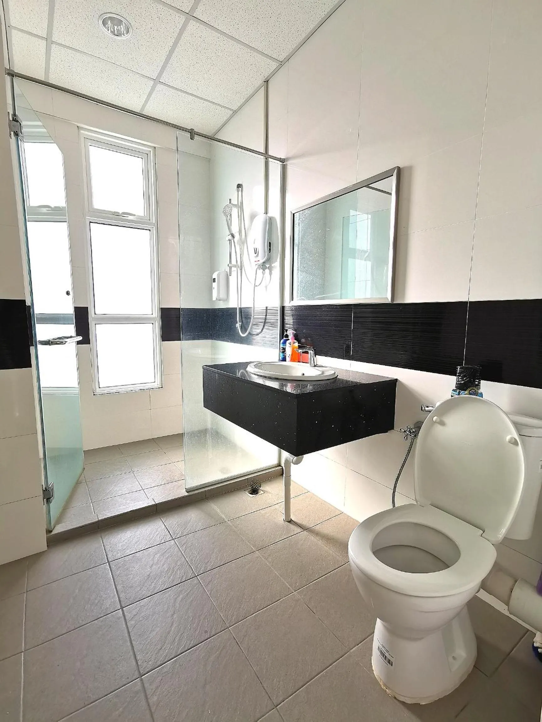 Toilet in Mansion One by Sky Hive