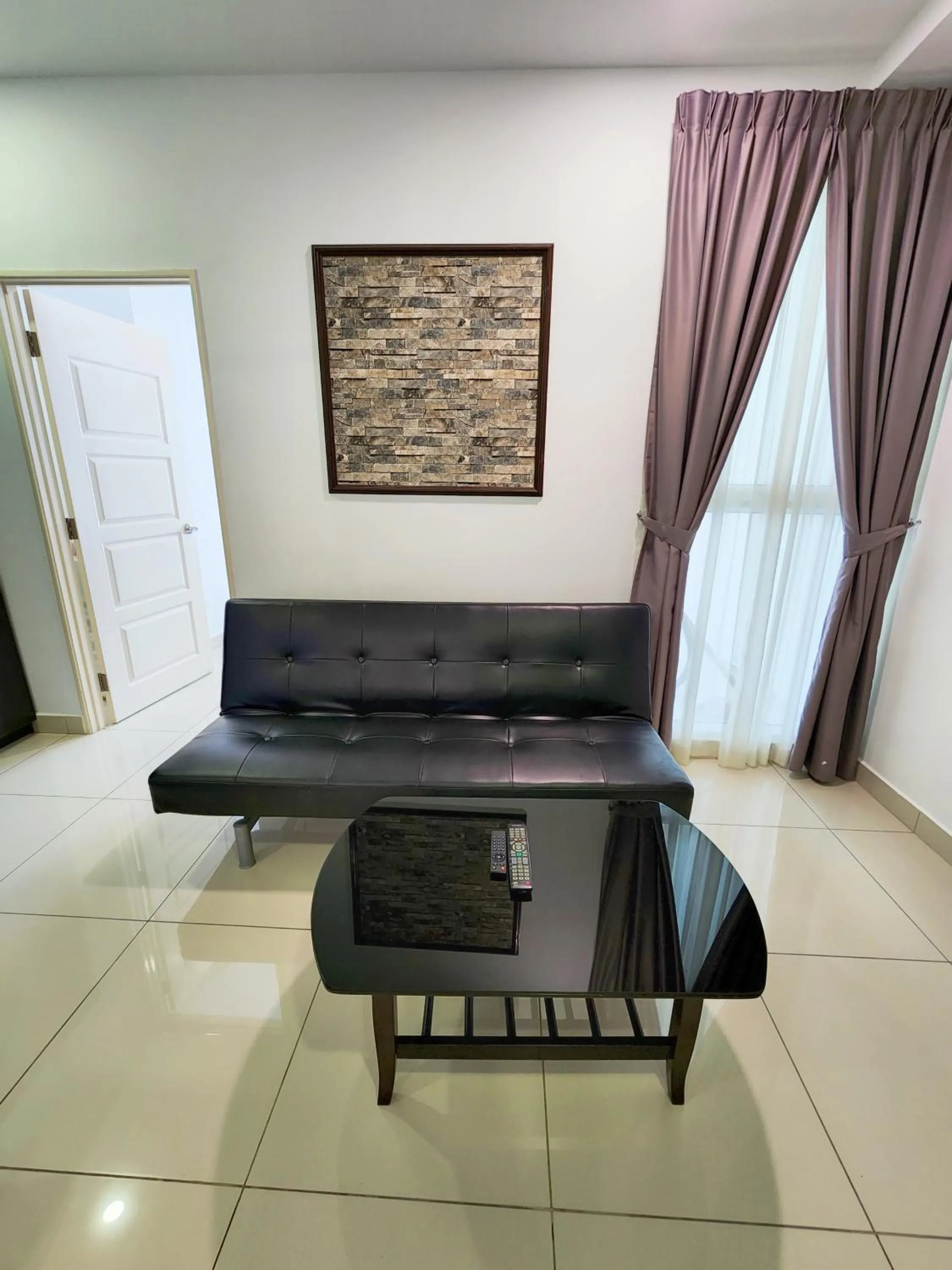 Living room in Mansion One by Sky Hive