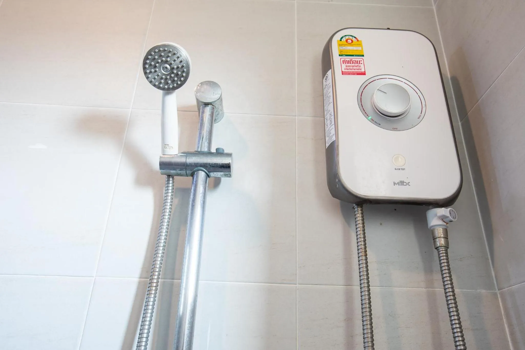 Shower in The Living Hotel SamutPrakan