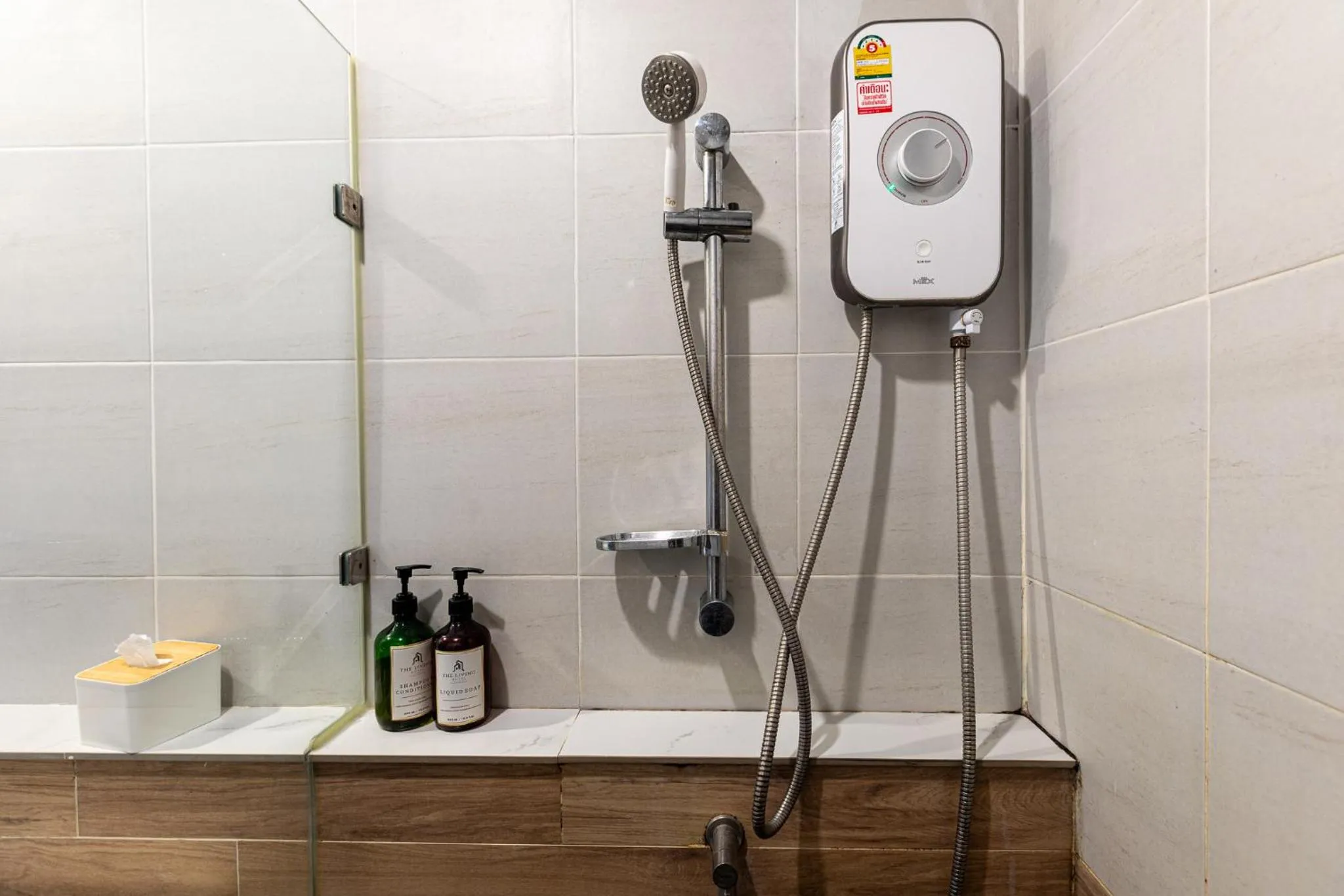 Shower in The Living Hotel SamutPrakan