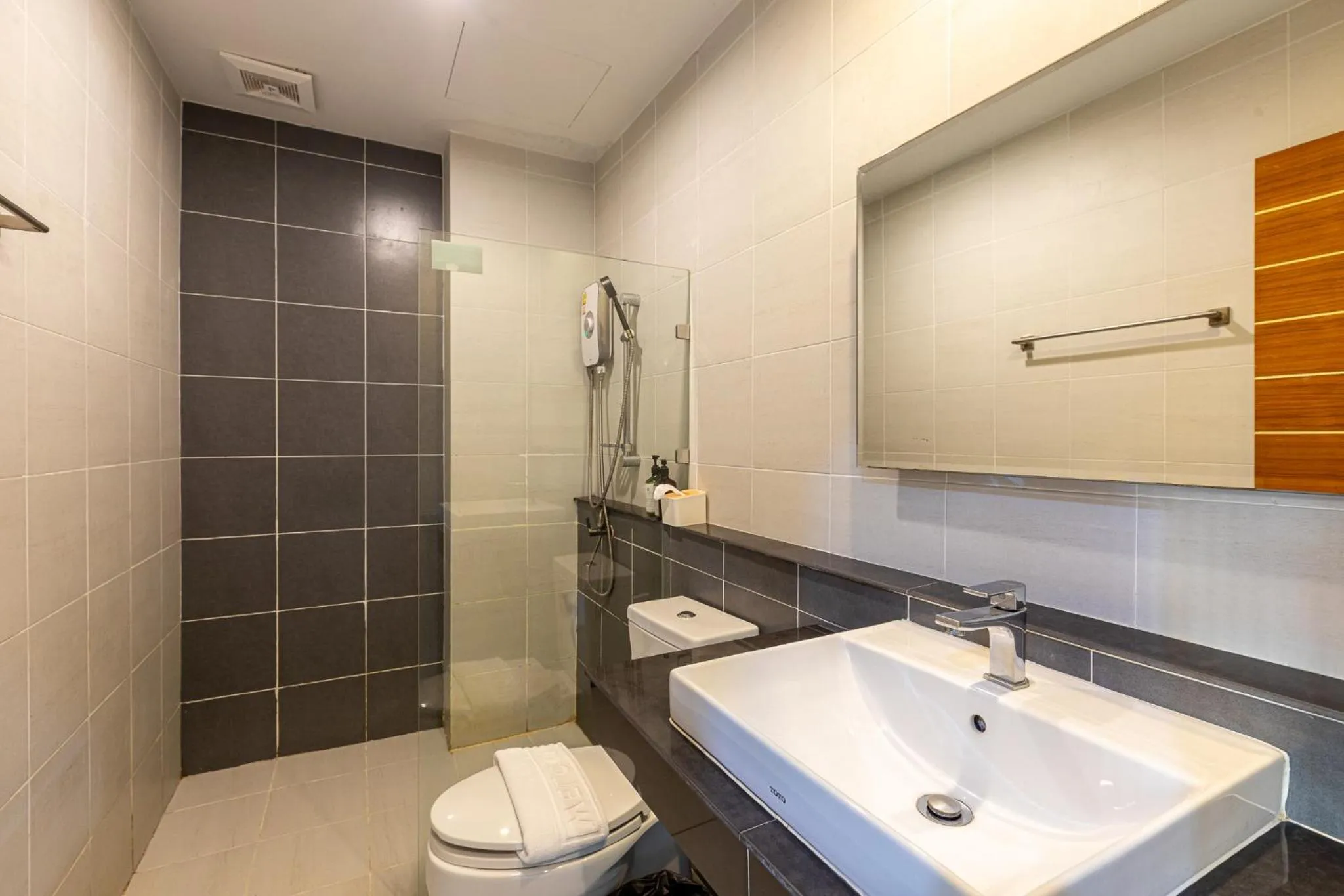 Toilet in The Living Hotel SamutPrakan