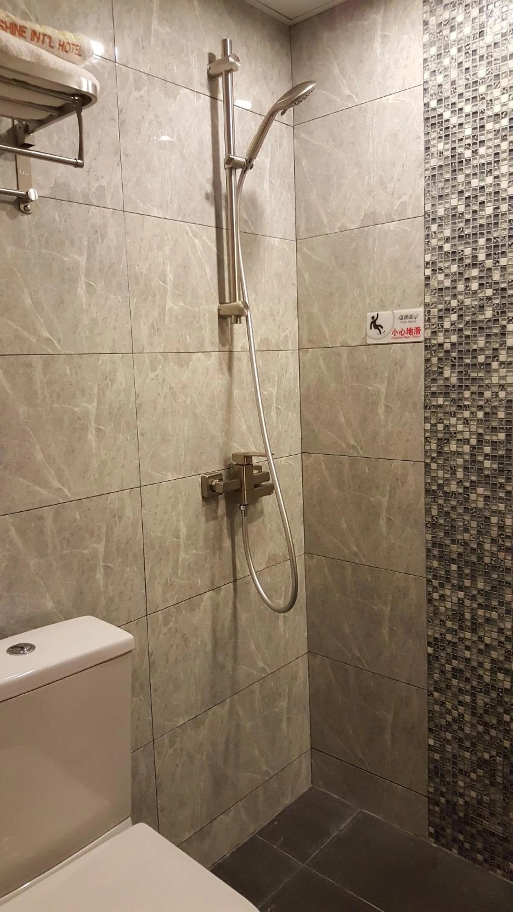 Shower in Whole Sunshine International Guest House