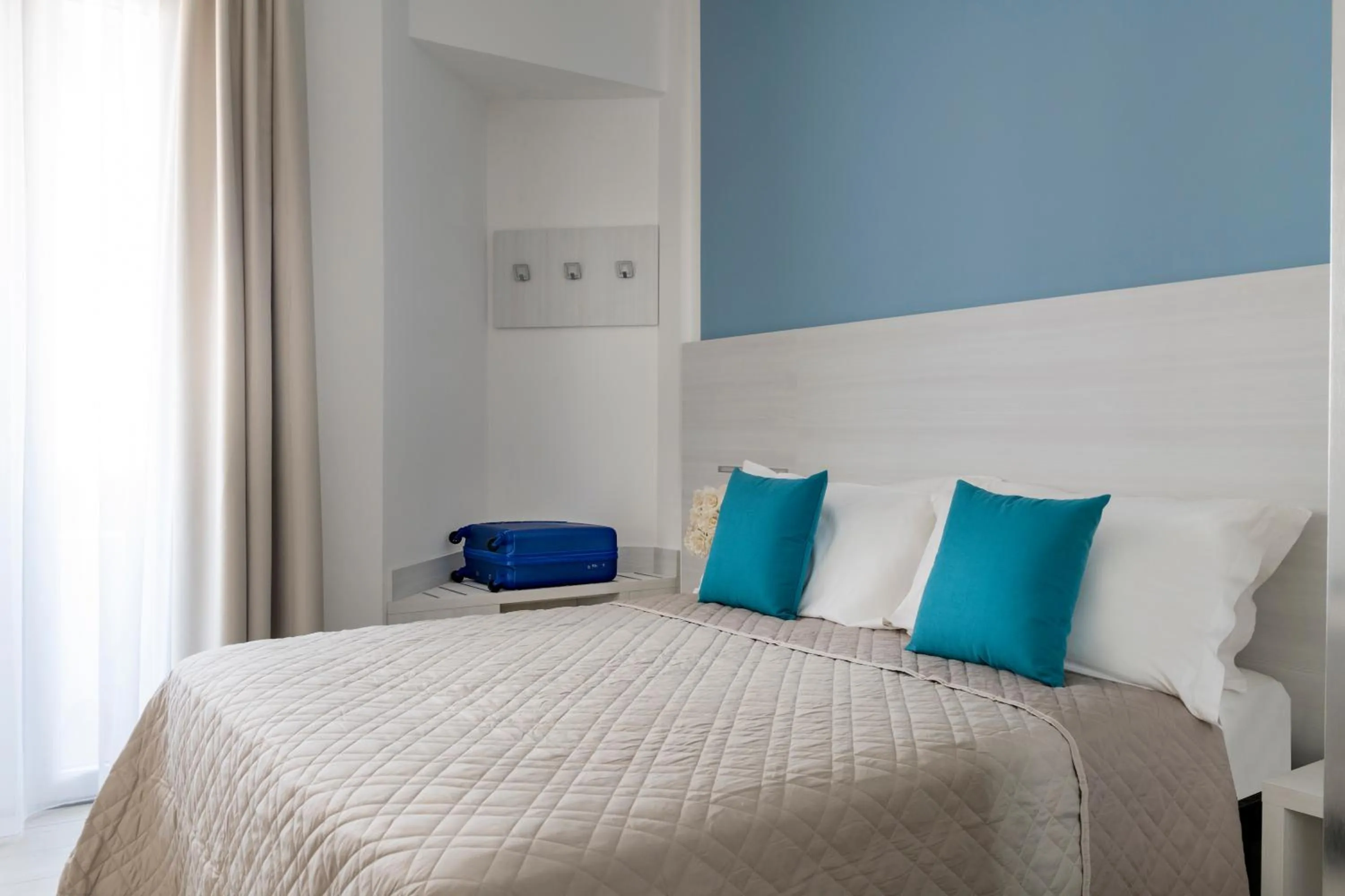 Bed in Hotel Raffaello