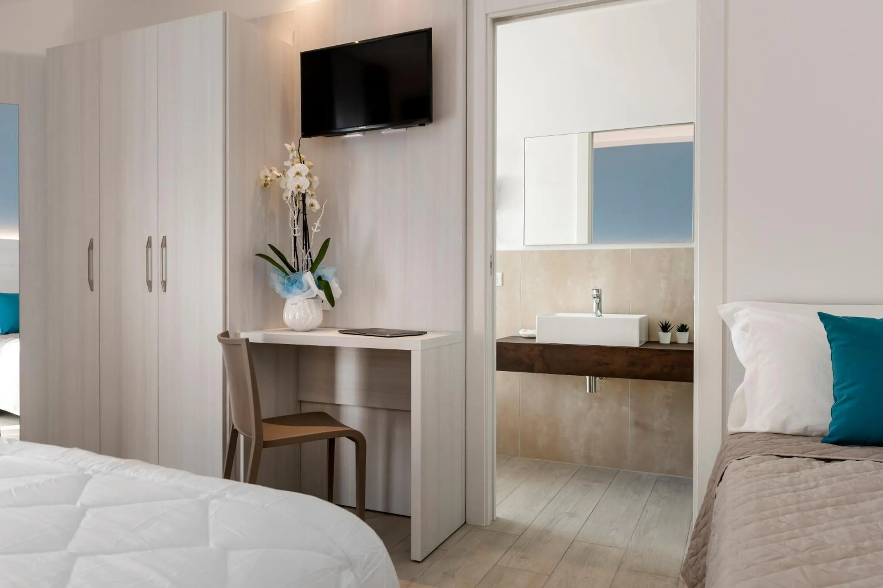 Bed in Hotel Raffaello