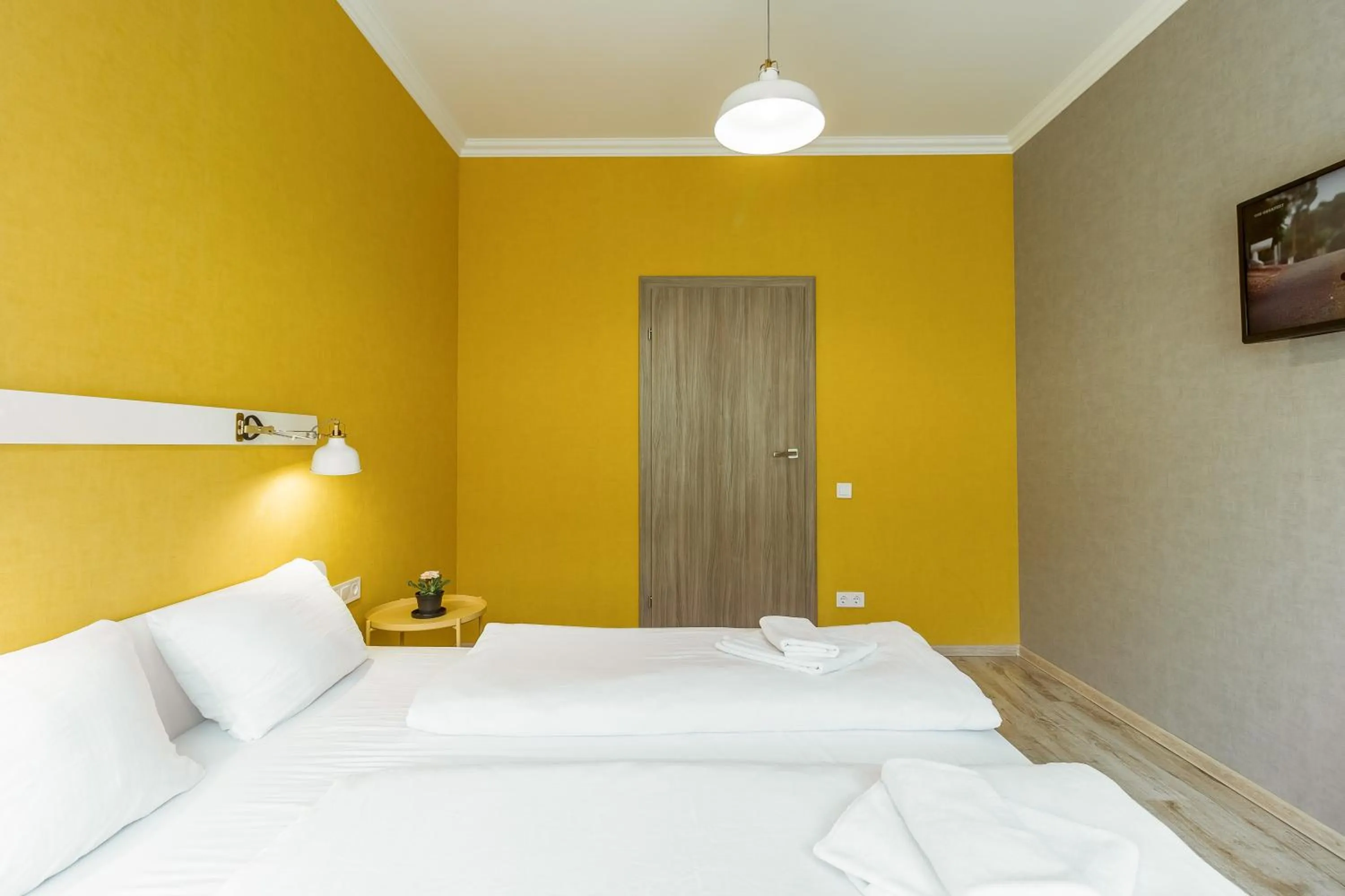 Bed in Opera Passage Hotel & Apartments