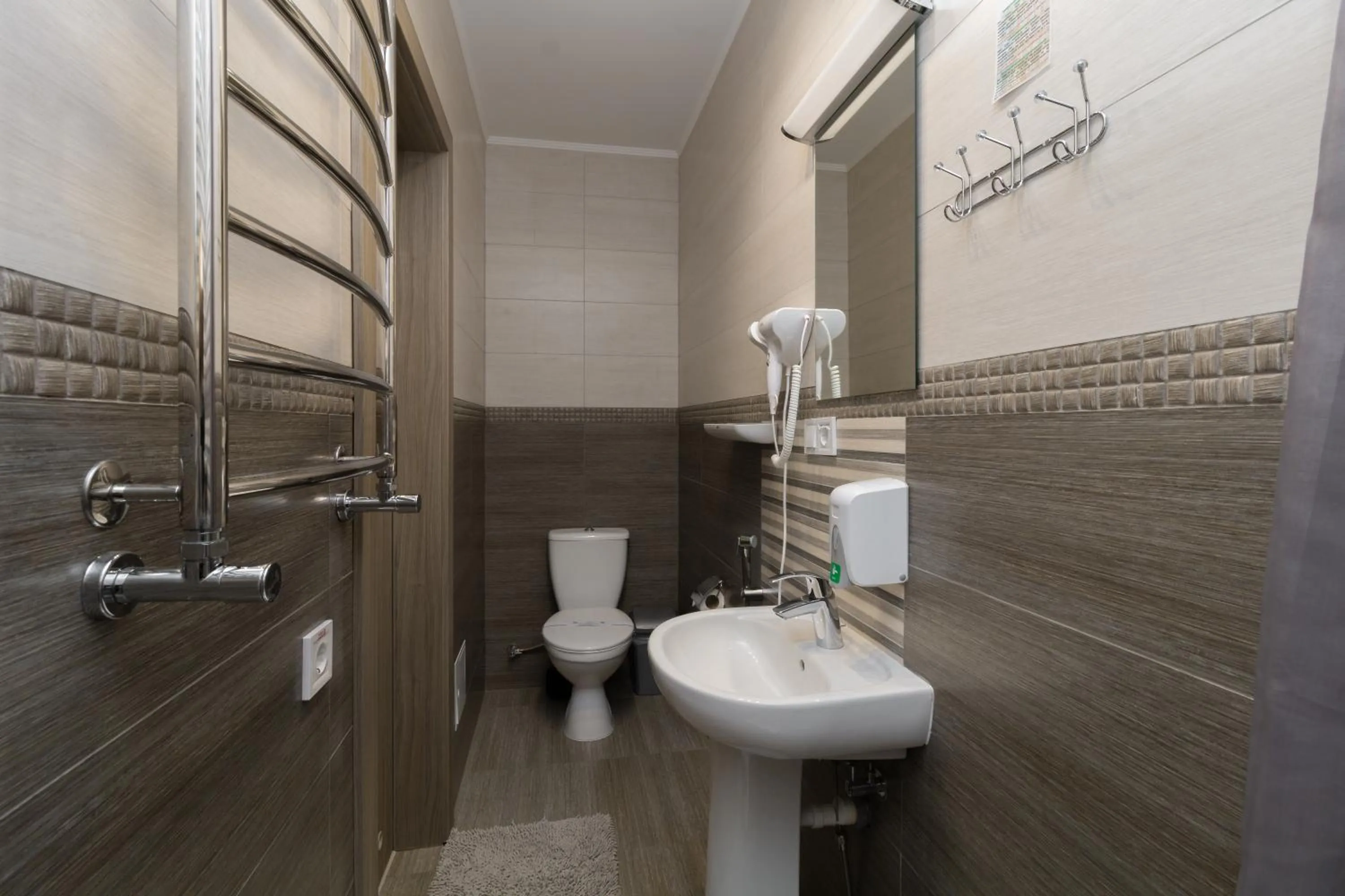 Toilet in Opera Passage Hotel & Apartments