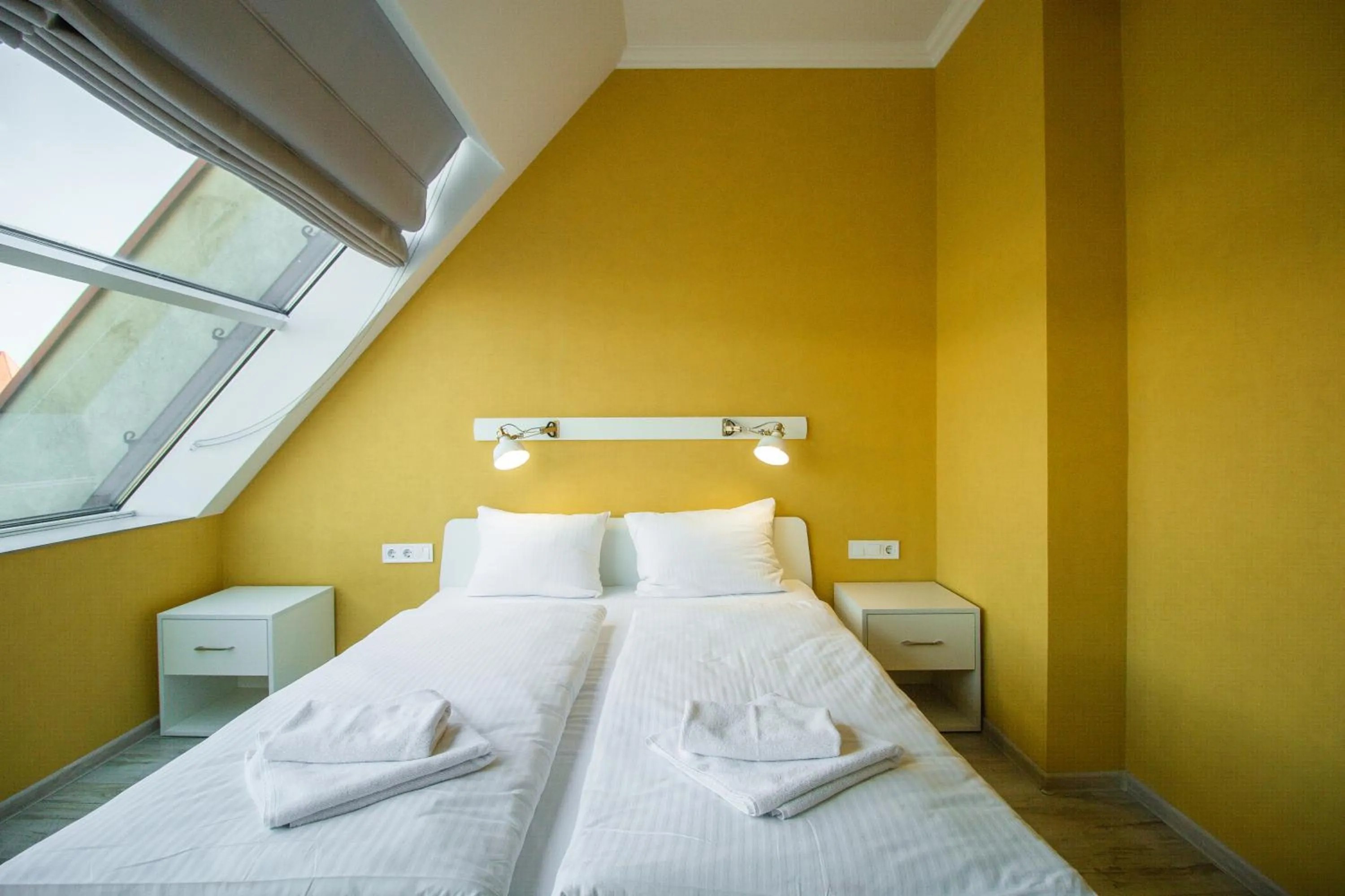 Bed in Opera Passage Hotel & Apartments