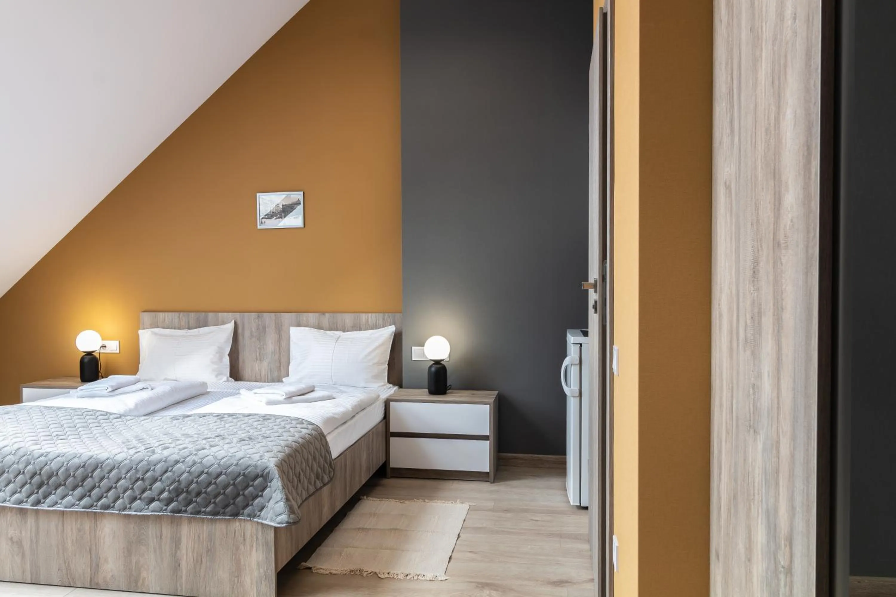 Bed in Opera Passage Hotel & Apartments