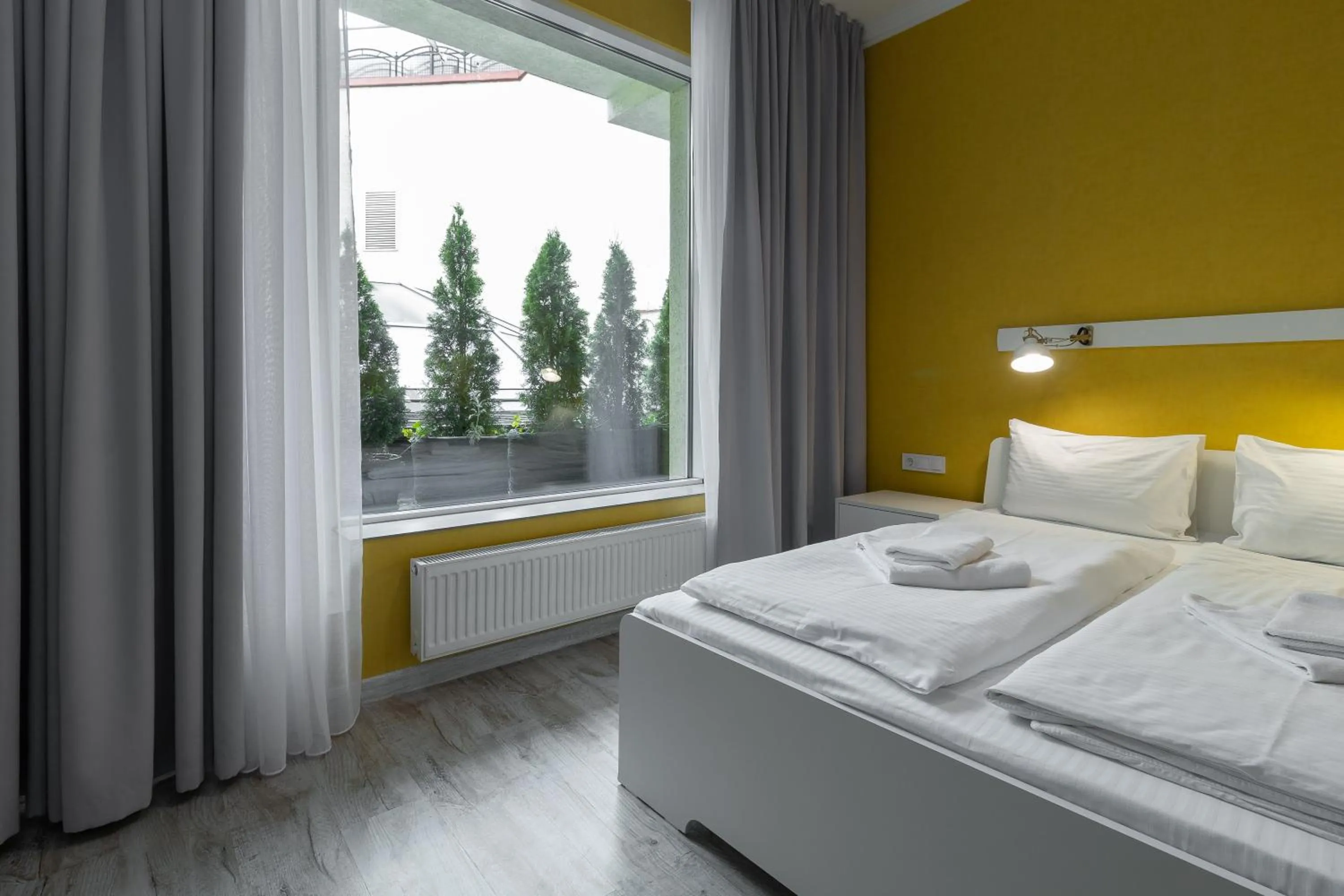 Bed in Opera Passage Hotel & Apartments