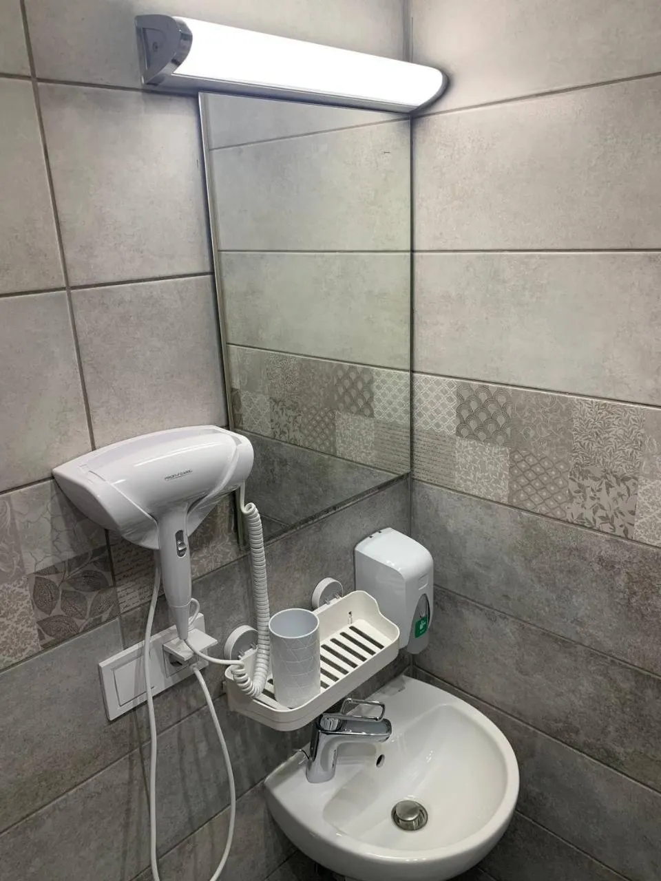 Bathroom in Opera Passage Hotel & Apartments