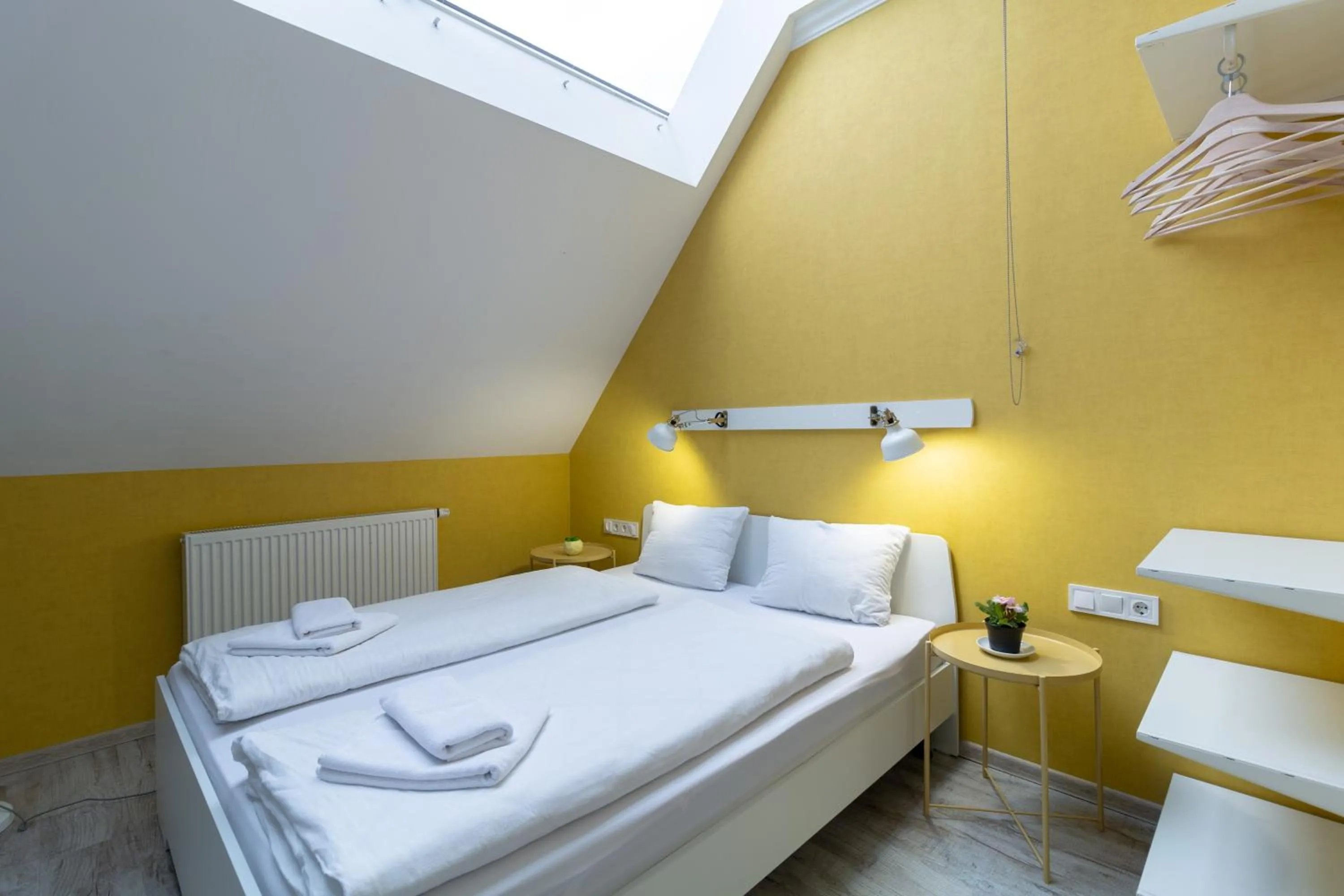 Bed in Opera Passage Hotel & Apartments