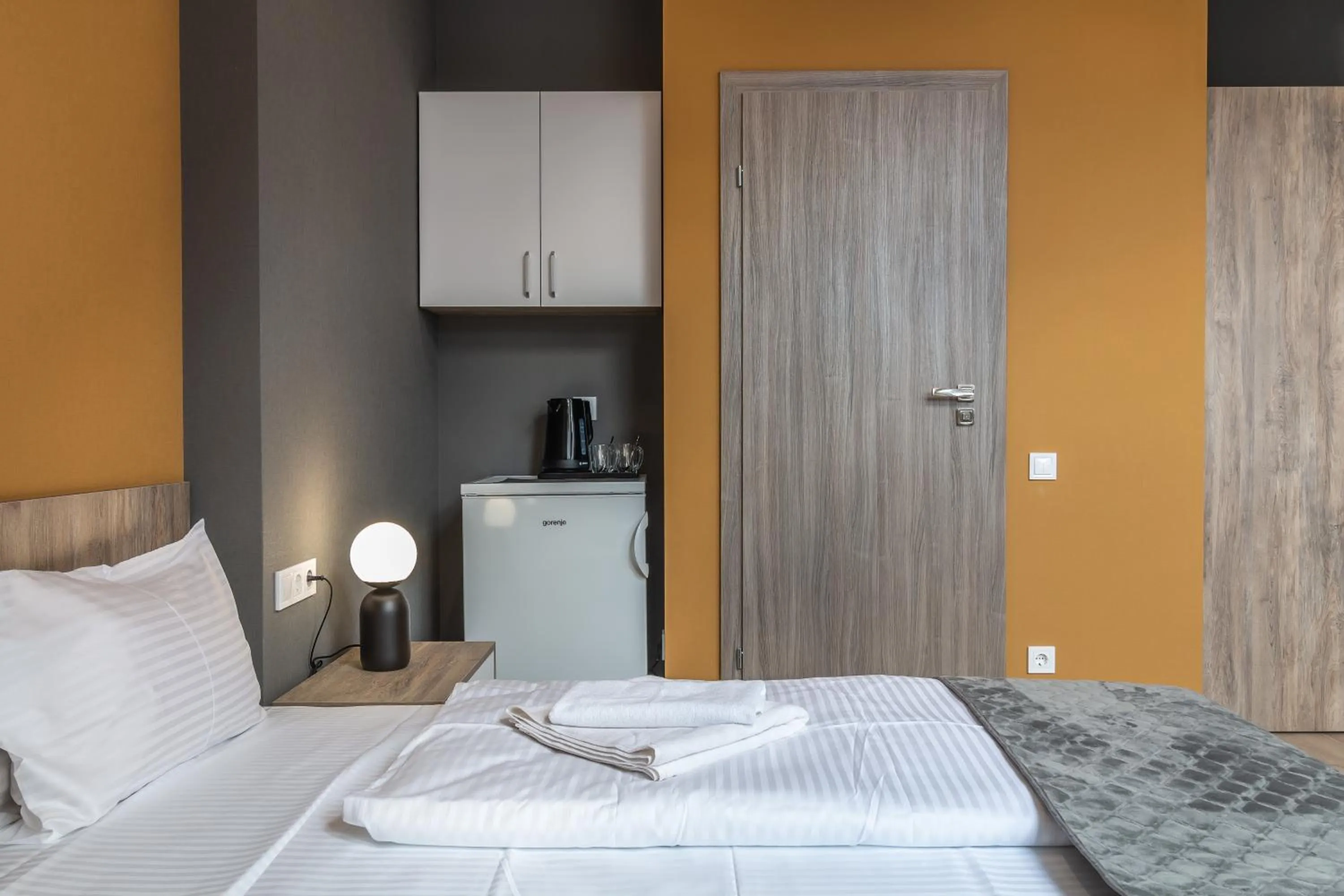 Bed in Opera Passage Hotel & Apartments