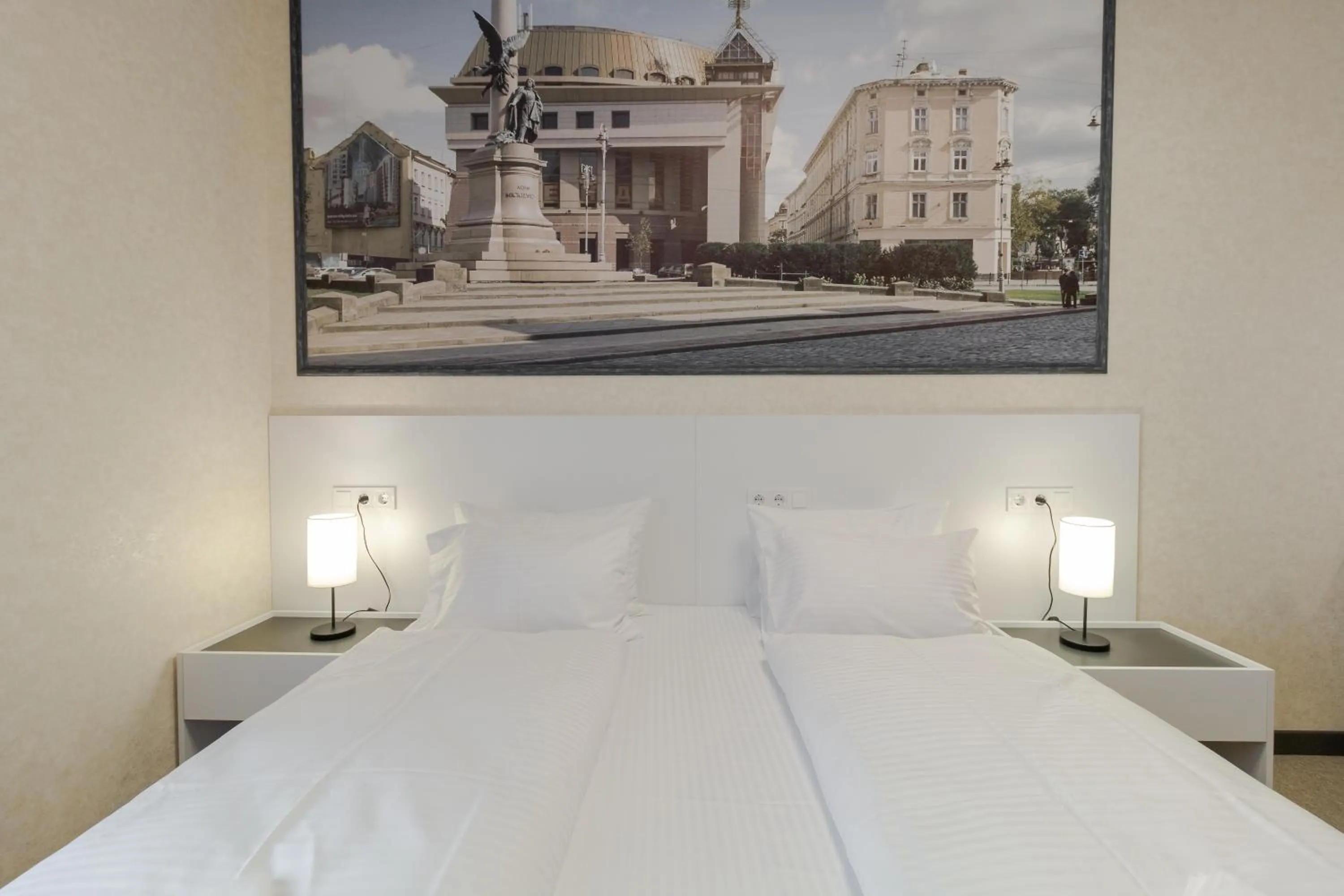 Bed in Opera Passage Hotel & Apartments