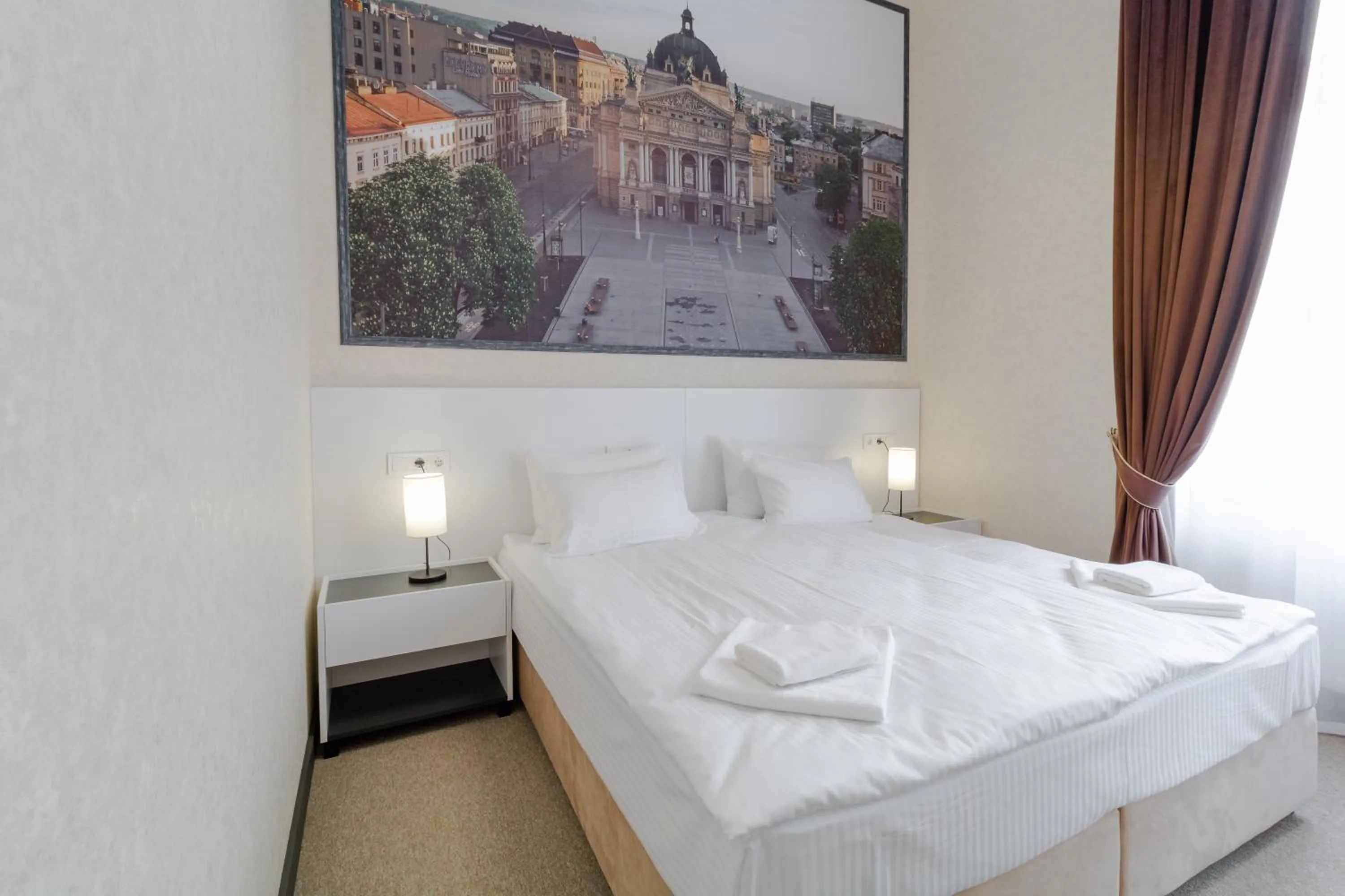 Bed in Opera Passage Hotel & Apartments