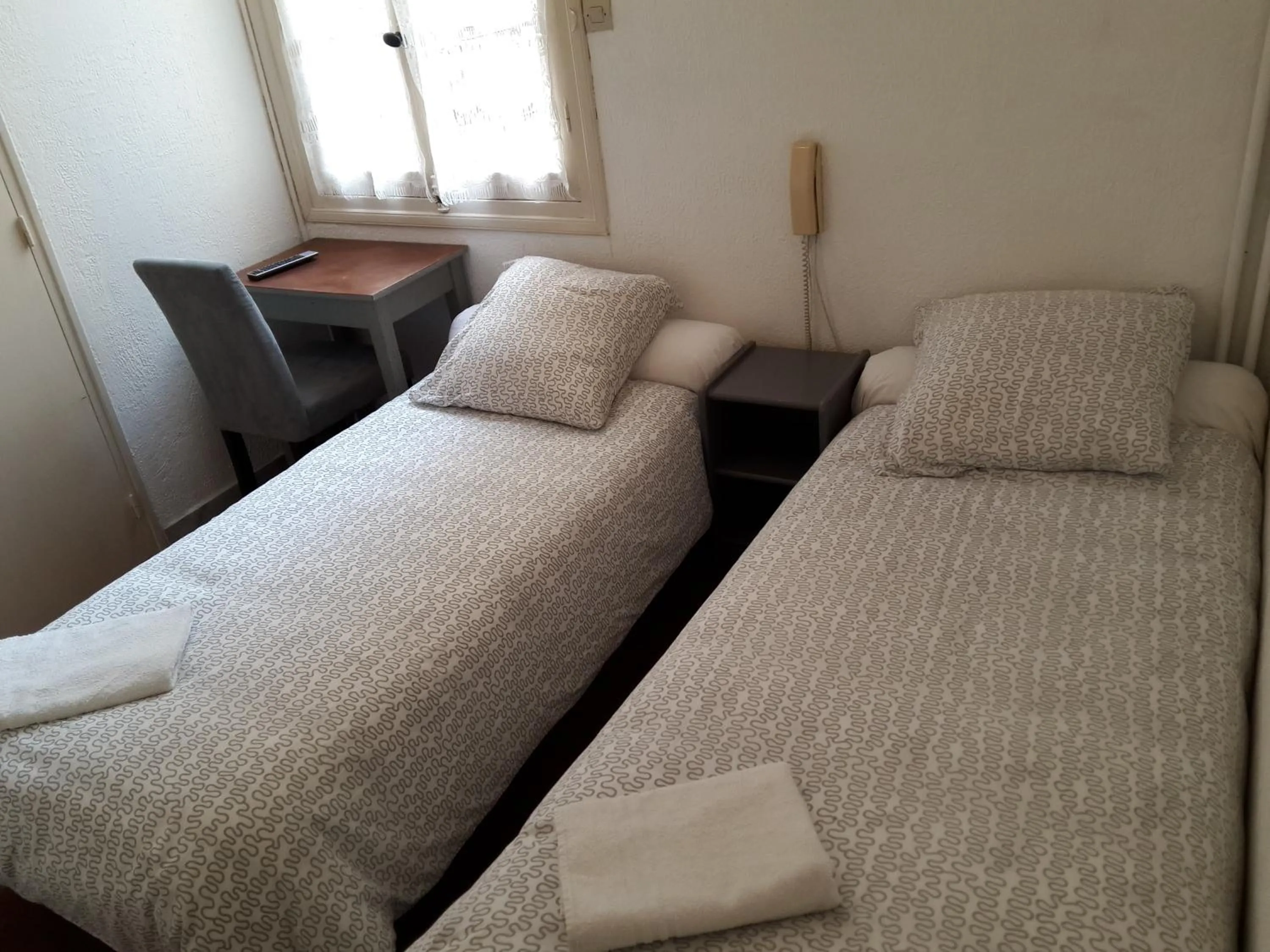 Bedroom in Hôtel Belle Meunière