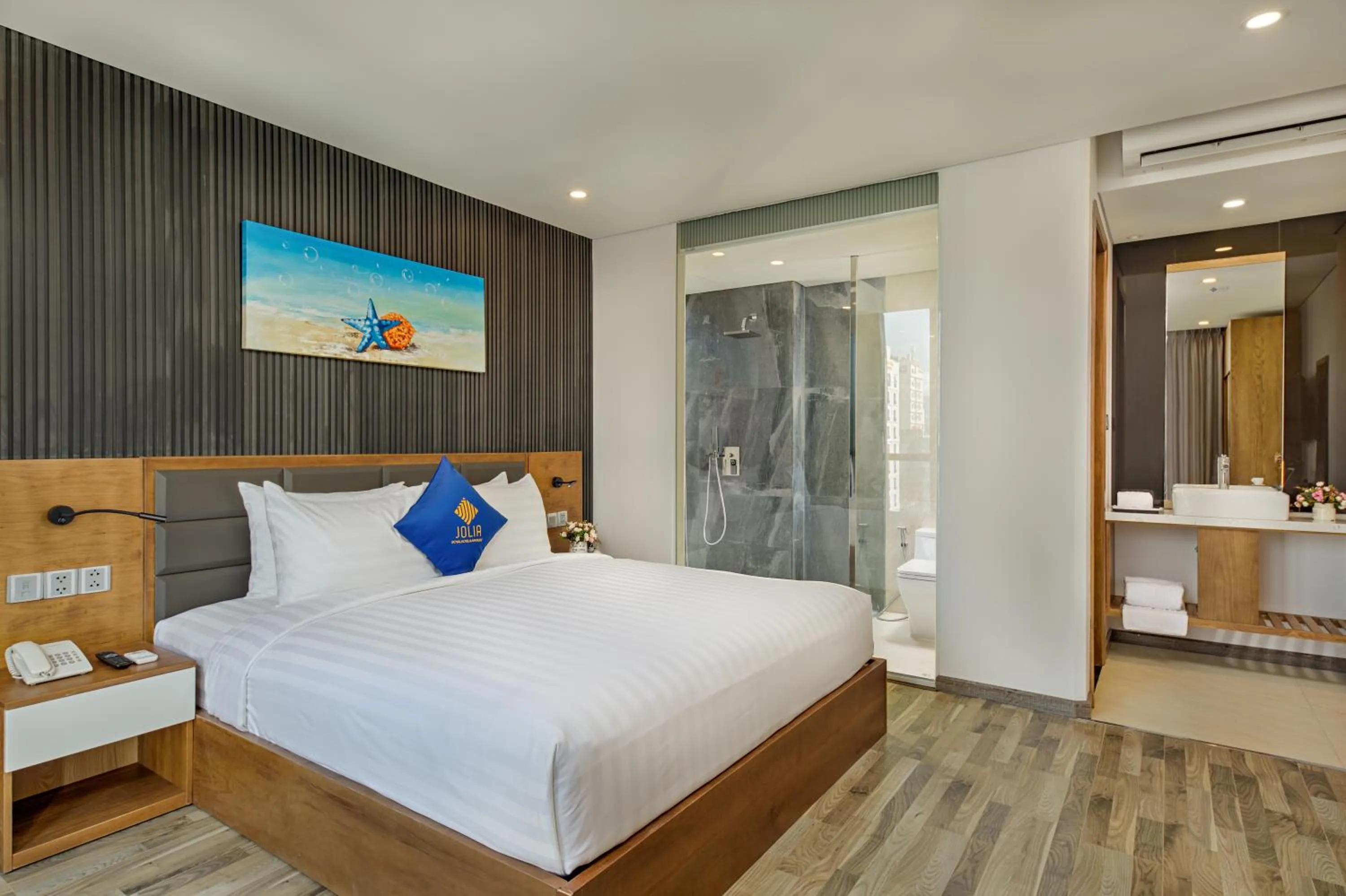 Bed in Jolia Hotel Danang Beach