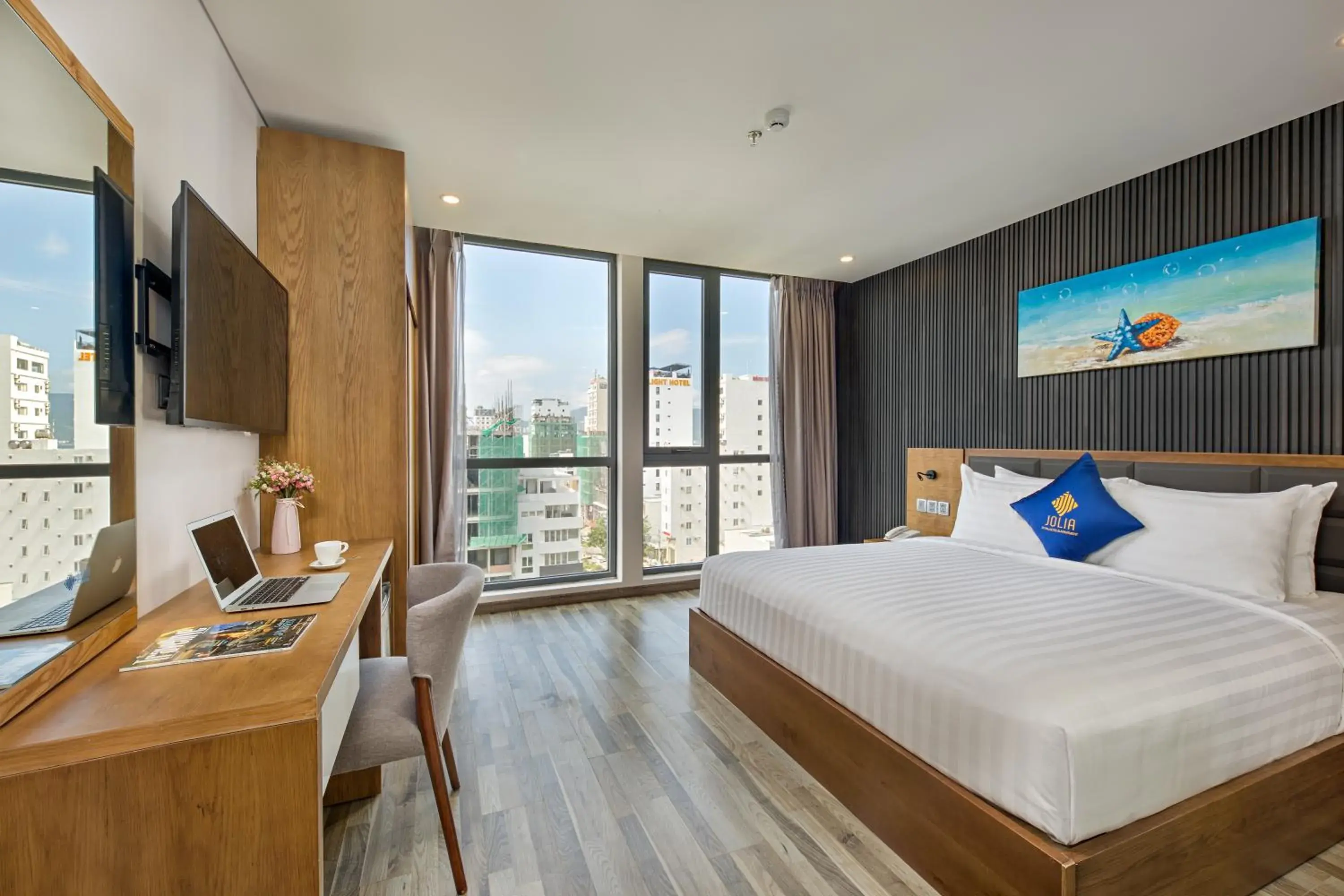 Deluxe King Room with City View in Jolia Hotel Danang Beach Deluxe King Room with City View in Jolia Hotel Danang Beach