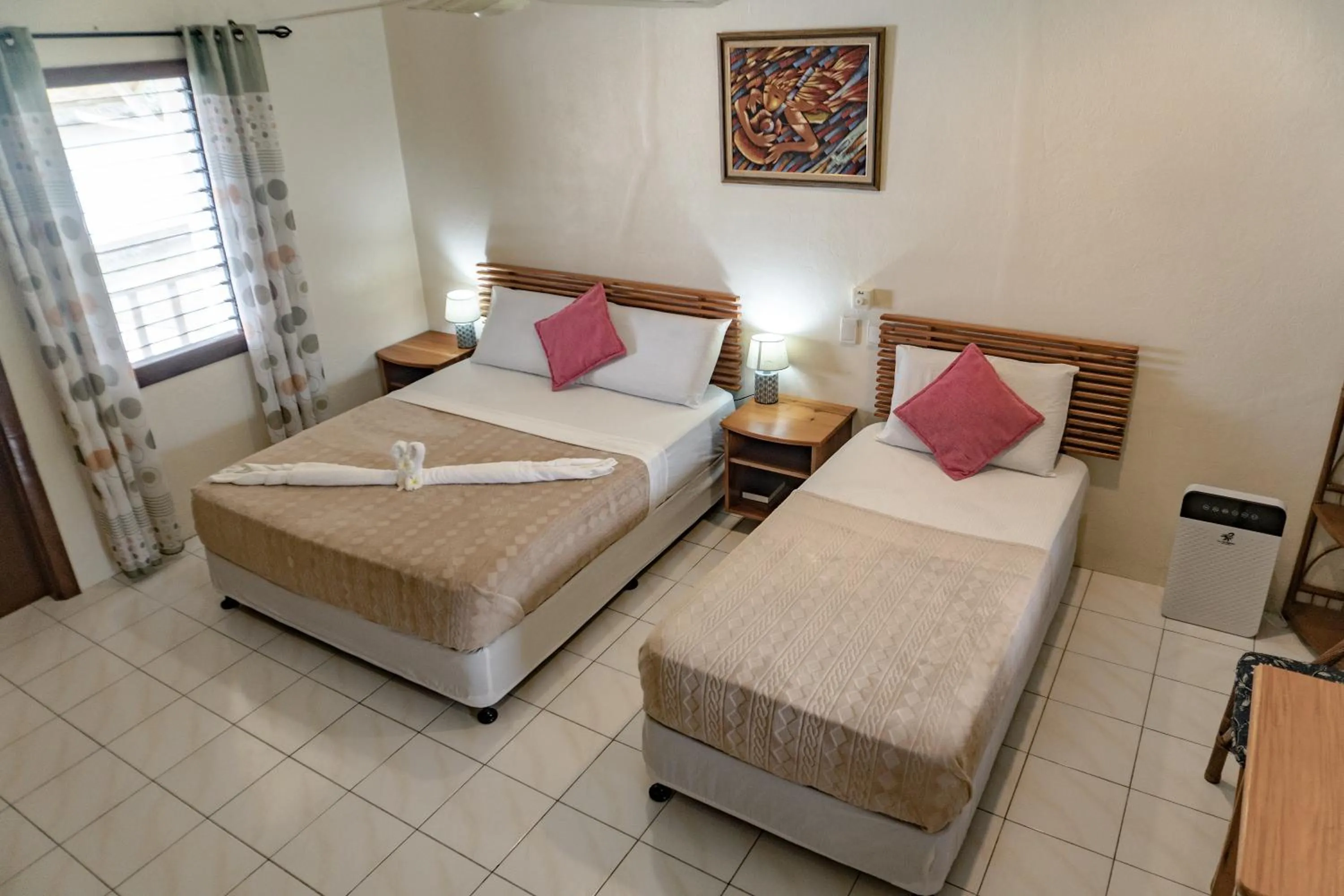 Bed in Quo Vadis Dive Resort
