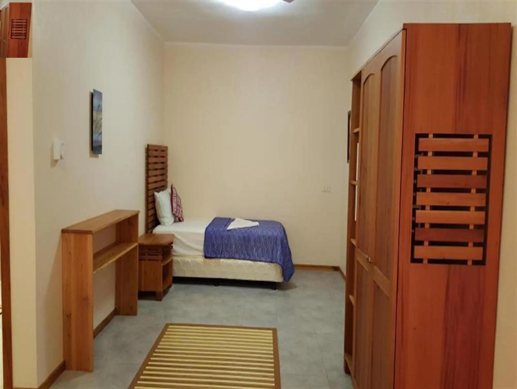 Bed in Quo Vadis Dive Resort