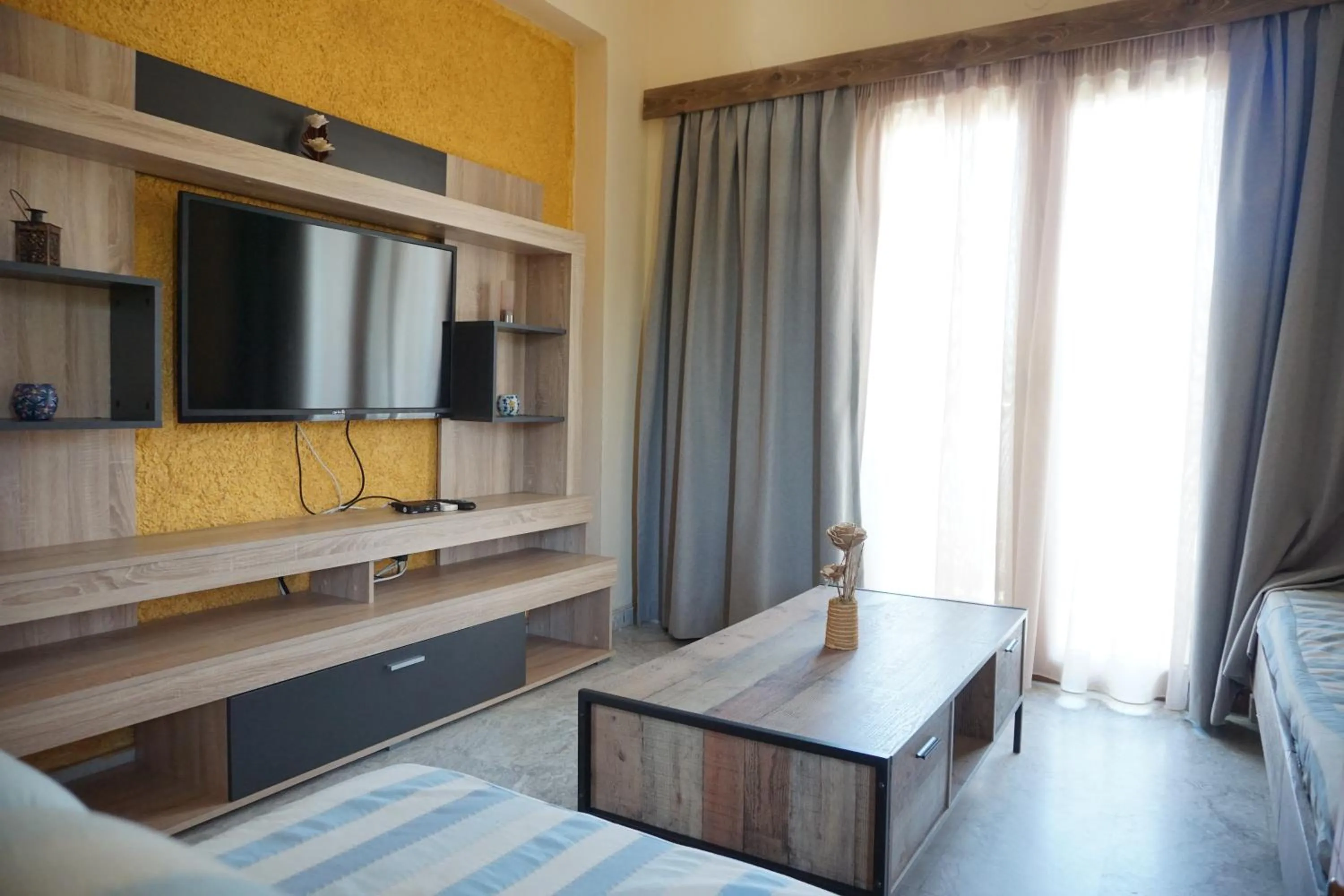 Seating area, Bed in Katerini Apartments Hotel